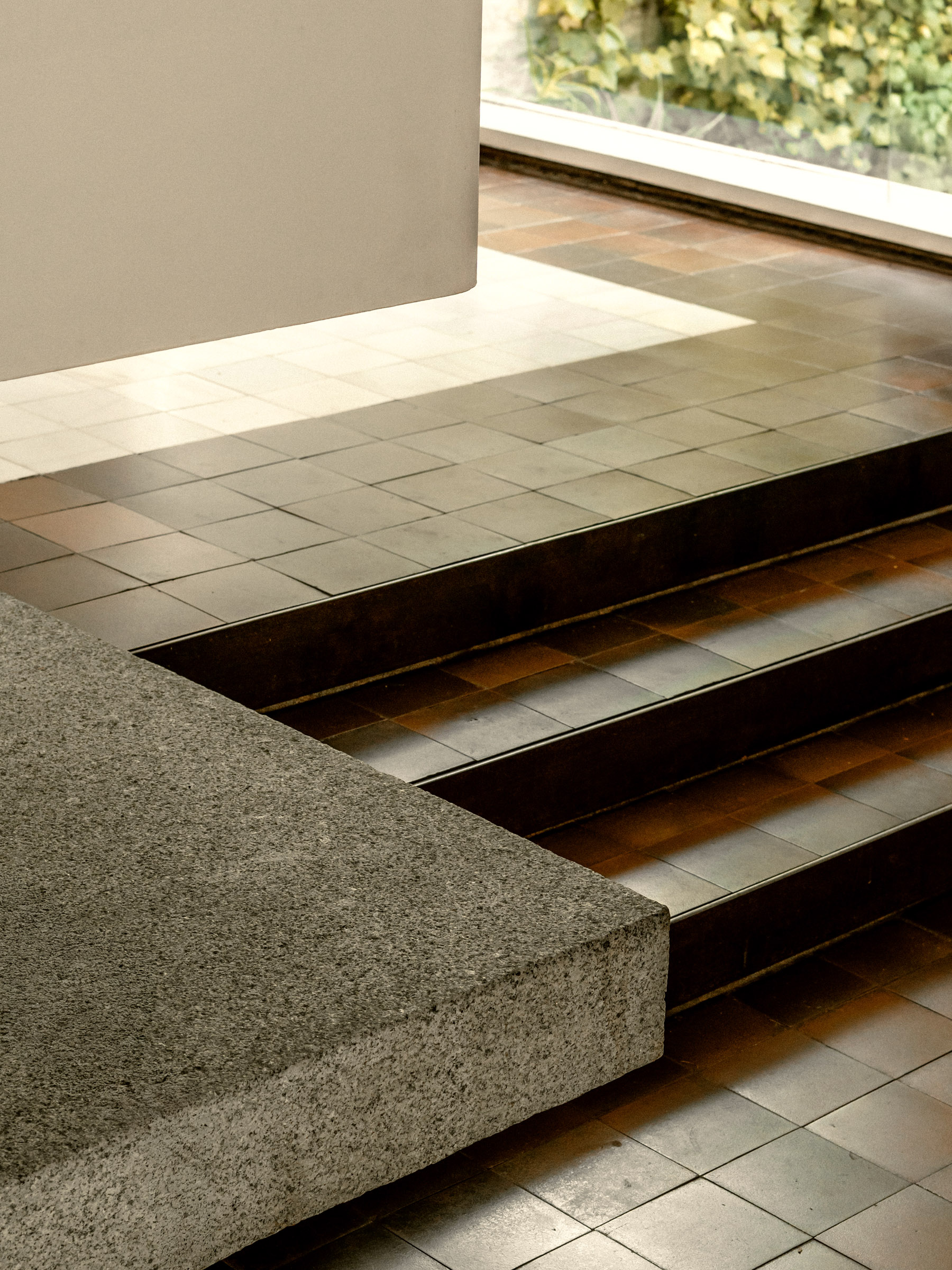 Concrete staircase and built-in seating detail inside Casa Carvajal.