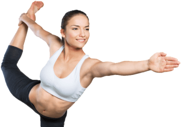 A person in workout attire gracefully performs a yoga pose, balancing on one leg with the other extended behind them, embodying both balance and dedication—key elements of any effective nutrition plan.