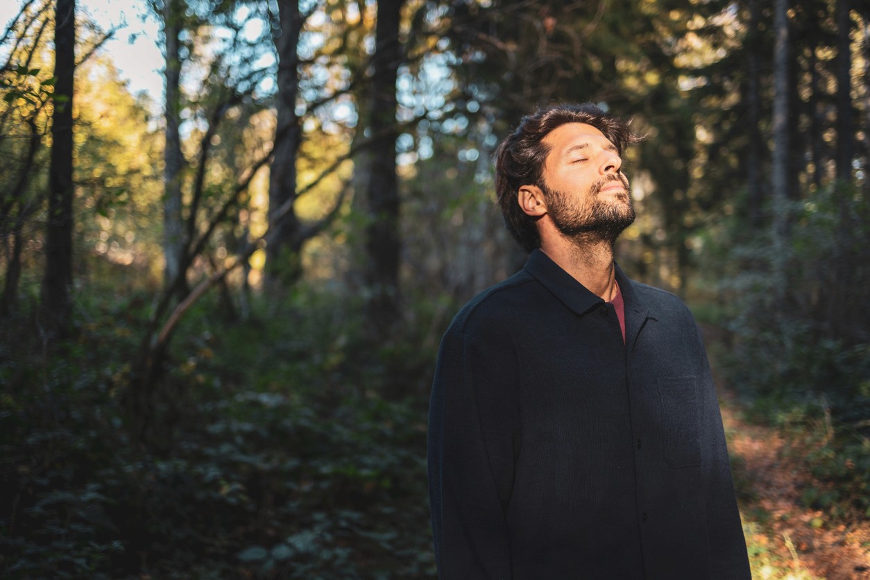 smiling man in doctor's office for heart check-up