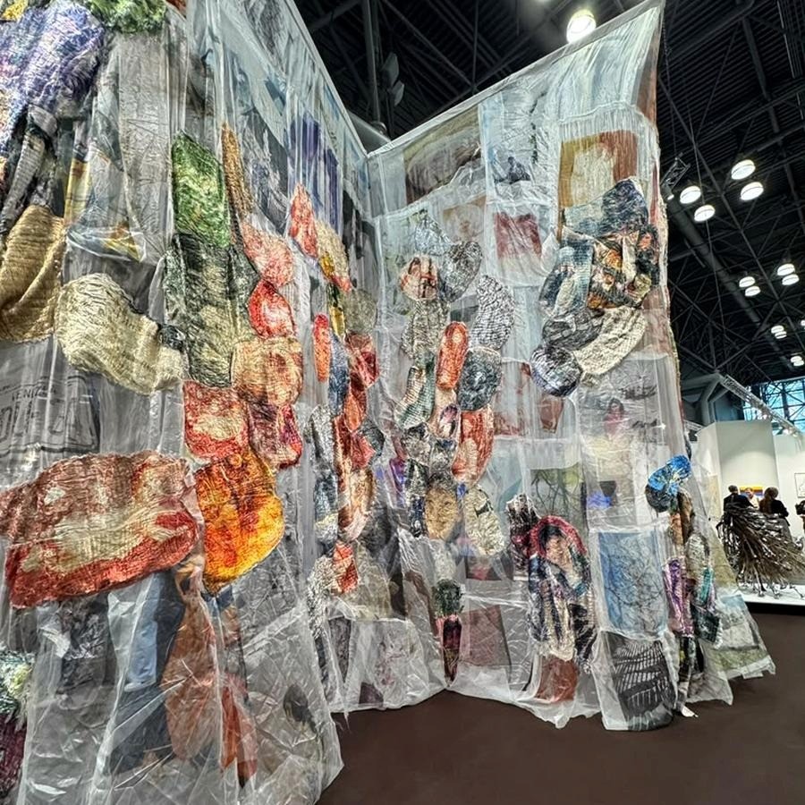 Lisu Vega’s A Momentary Whole (2025–26), in translucent polysilk, photographic transfer, sewing and constructed rope. From a distance, the faces resolve; up close, they come apart into thread.&nbsp; Courtesy the artist and Gladwell Projects