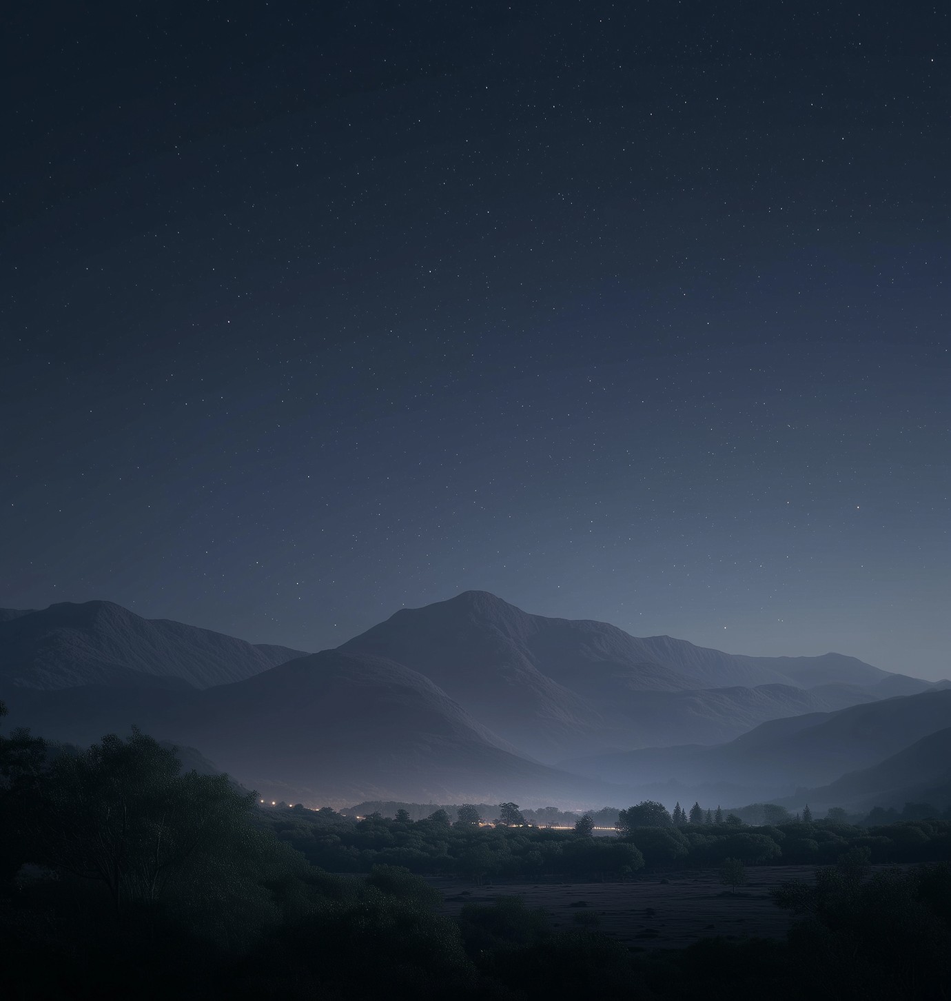night-sky-over-distant-mountains-and-city-glow