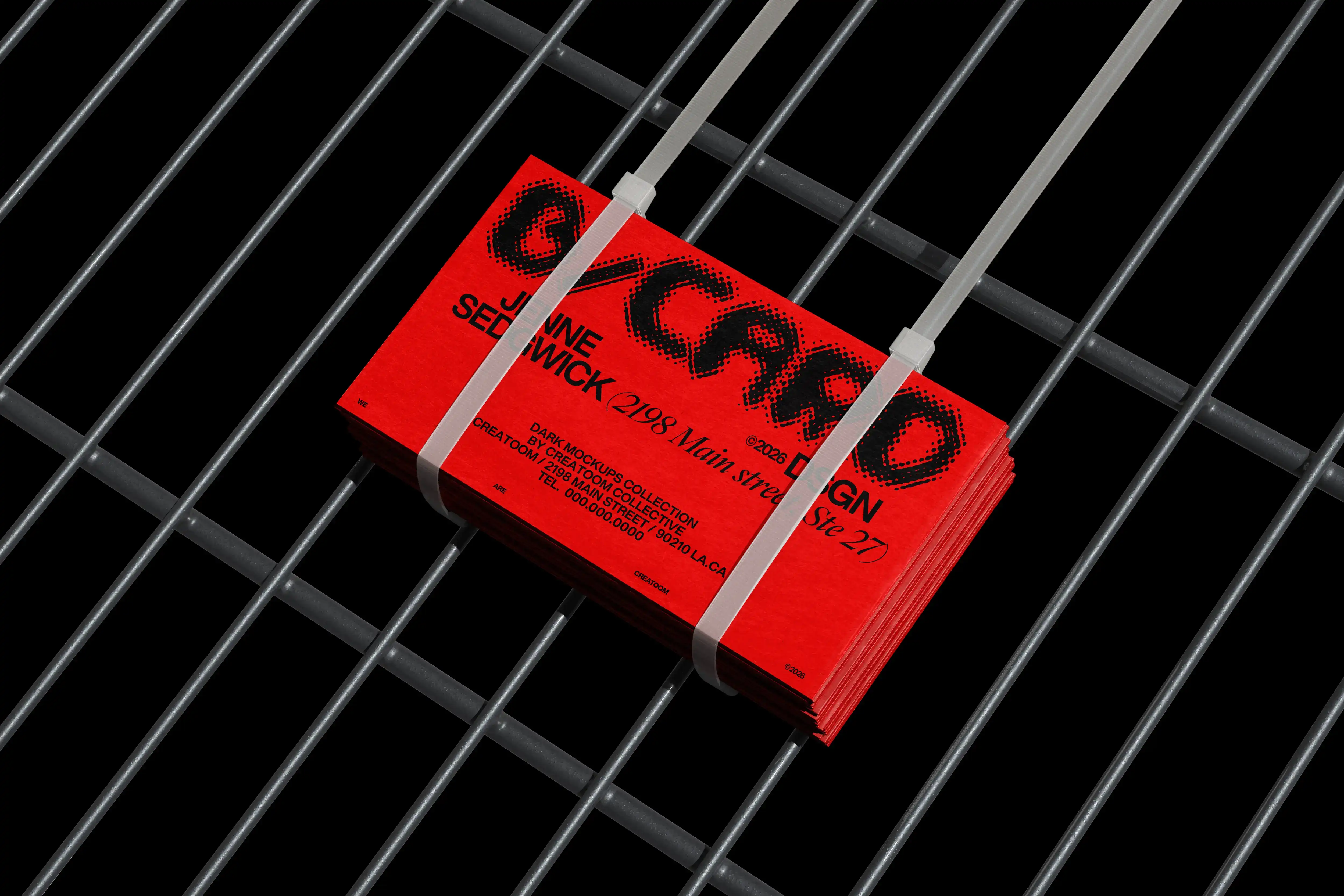 Red business cards with halftone typography stacked and banded