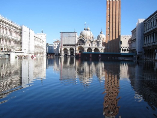 landscape of an artificial lake in the city with a blue sky