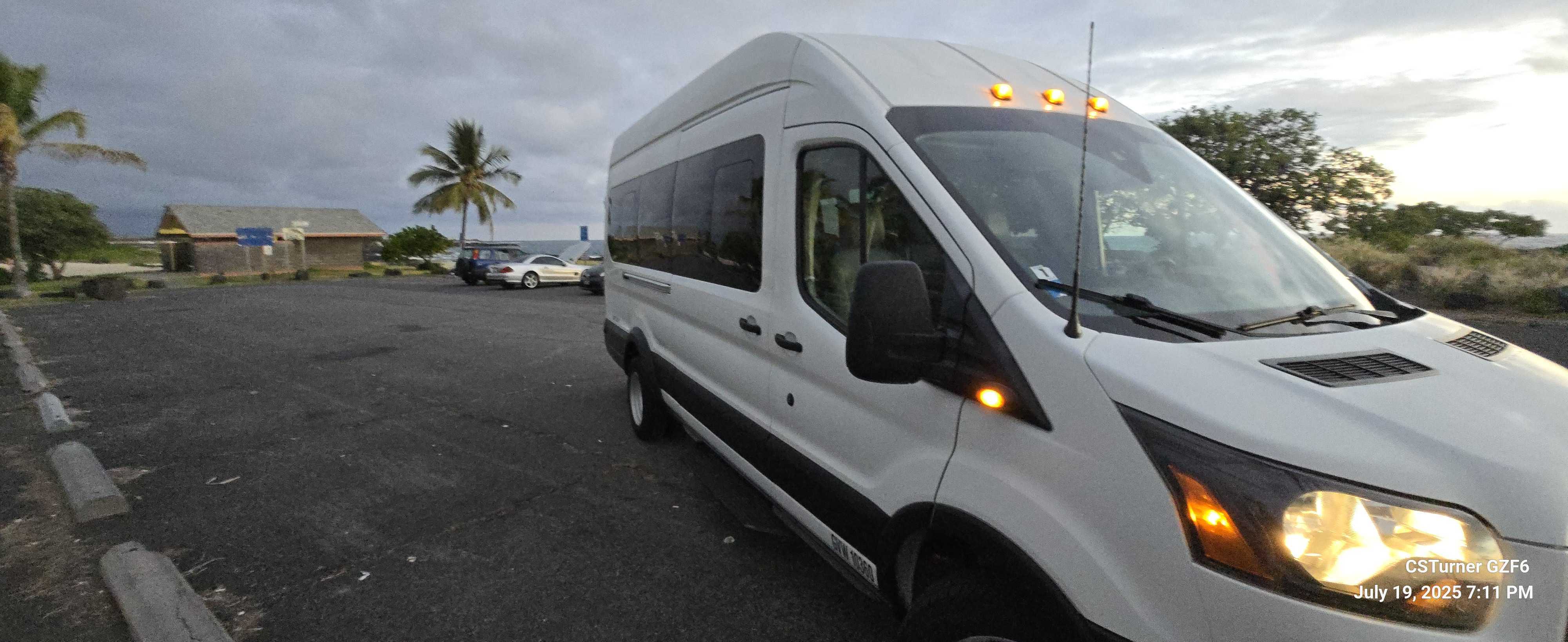 White Ford Transit XLT 15 Passenger Van Hawaii Big Island Sunset For Rent