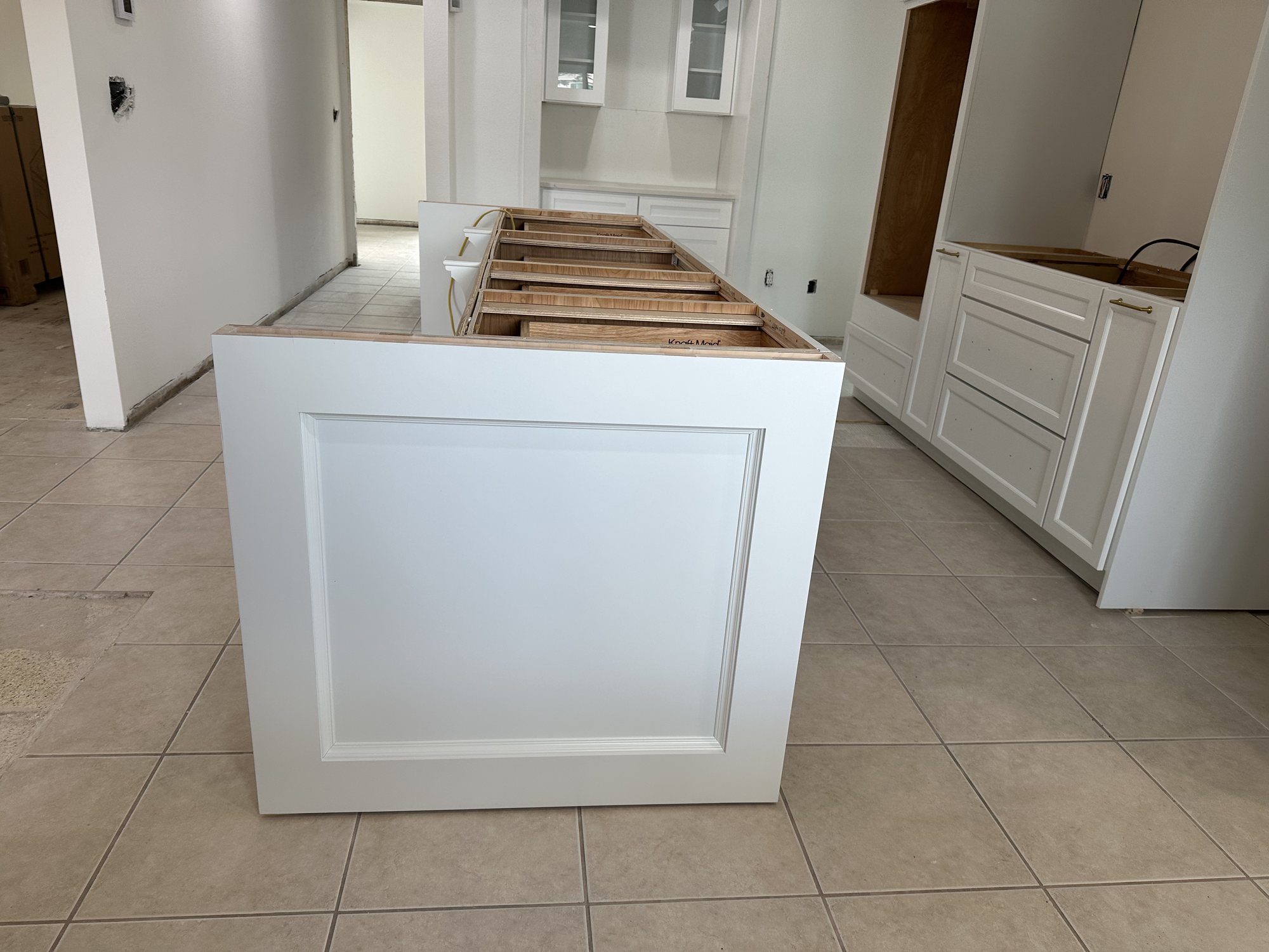 White Kitchen with a Large Island in Ruskin, Florida — photo 2