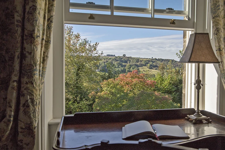 Hartingtons Heritage Tours hotel, Darley House, a view from the upatiars window with trees