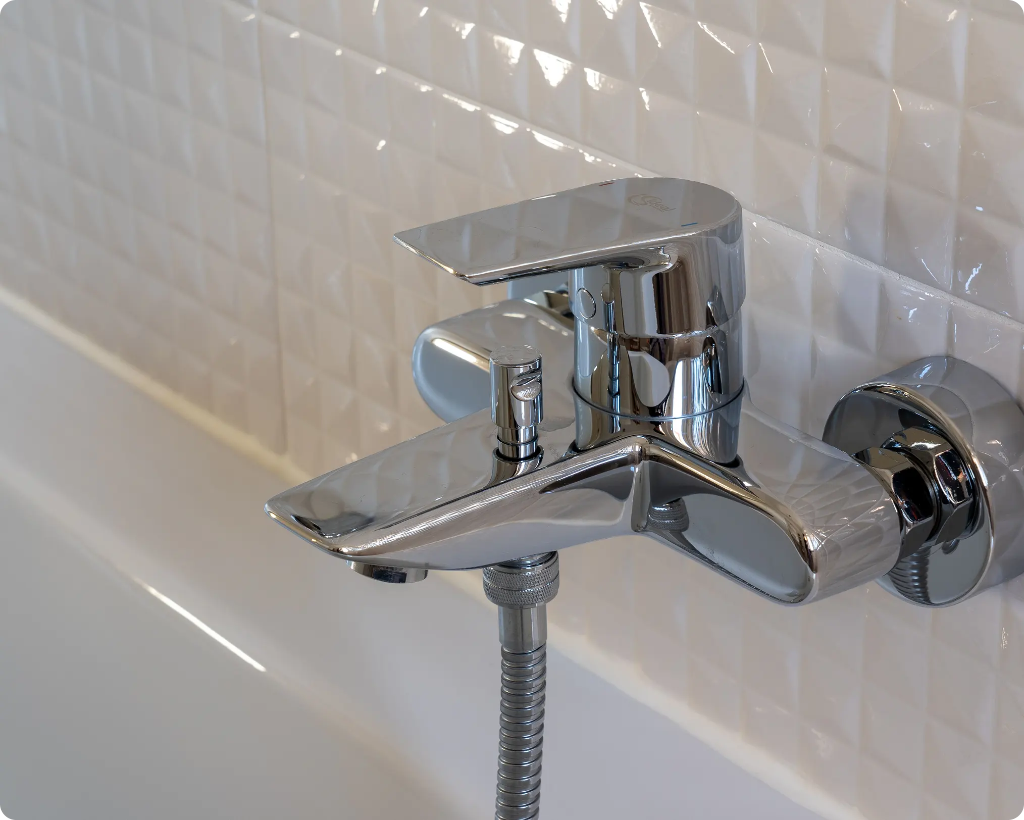 Newly renovated bathroom with modern plumbing fixtures