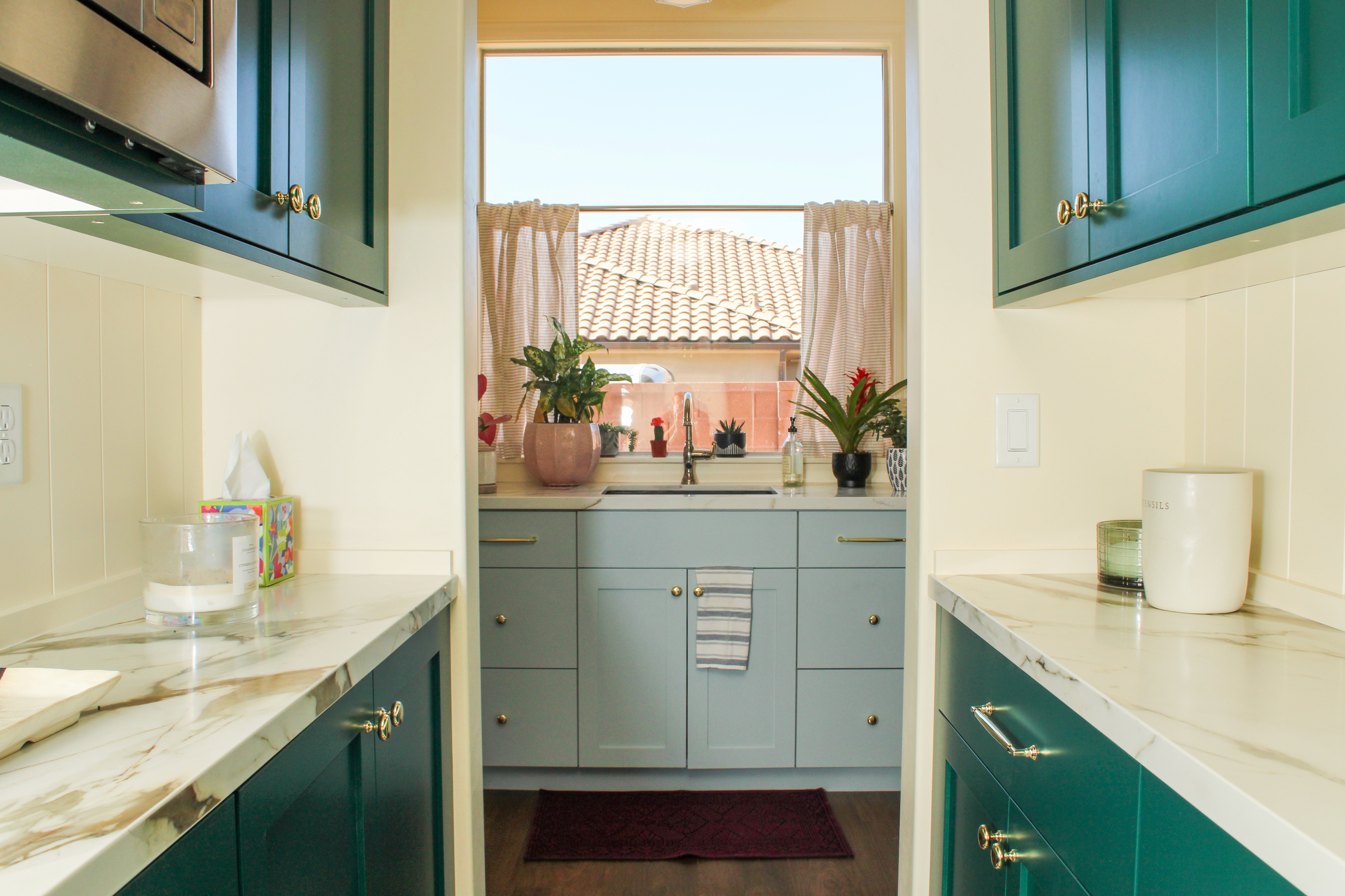 Kitchen remodel in Washington, Utah with a mix of blue cabinetry.
