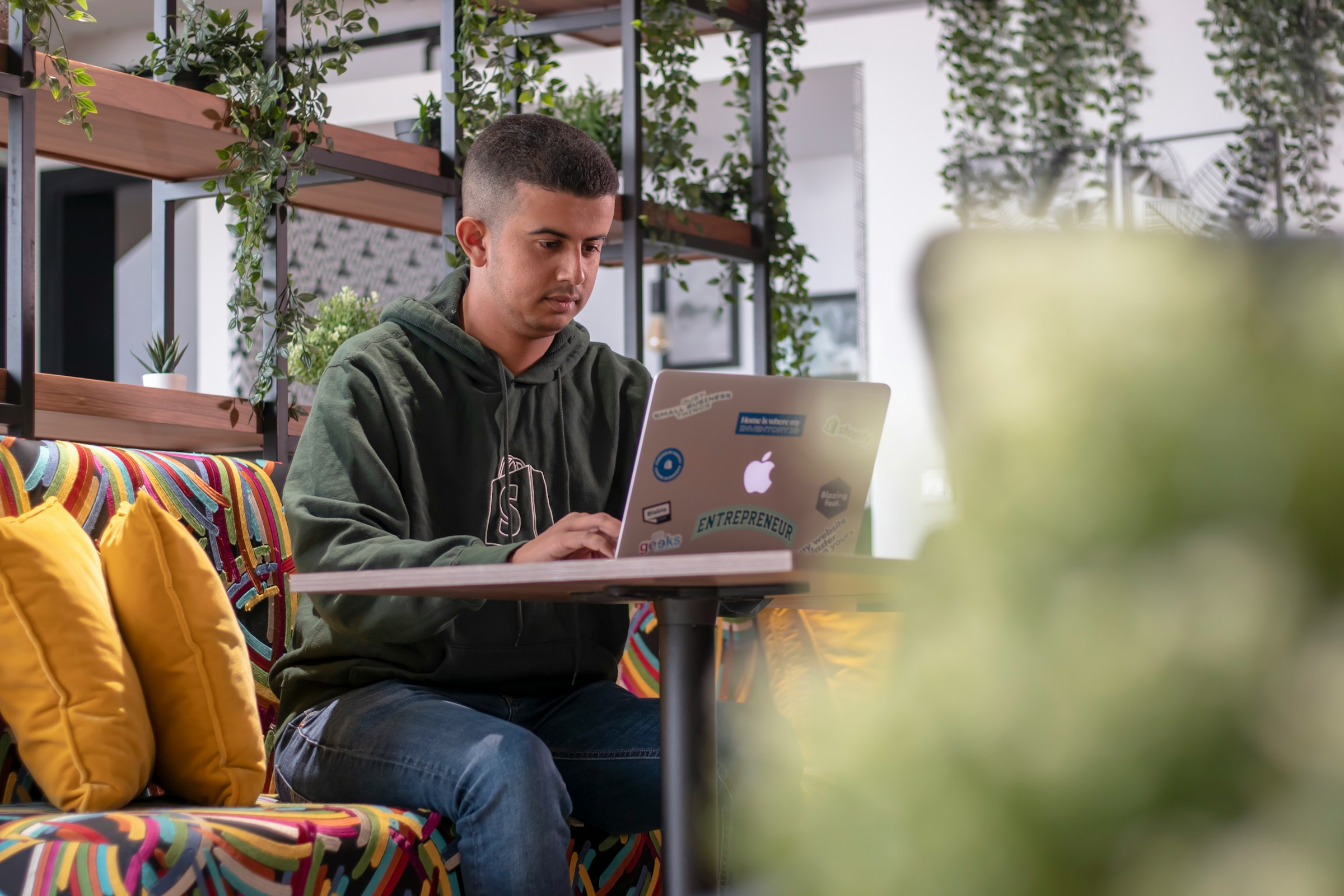 man sitting alone and working - How To Find Academic Sources