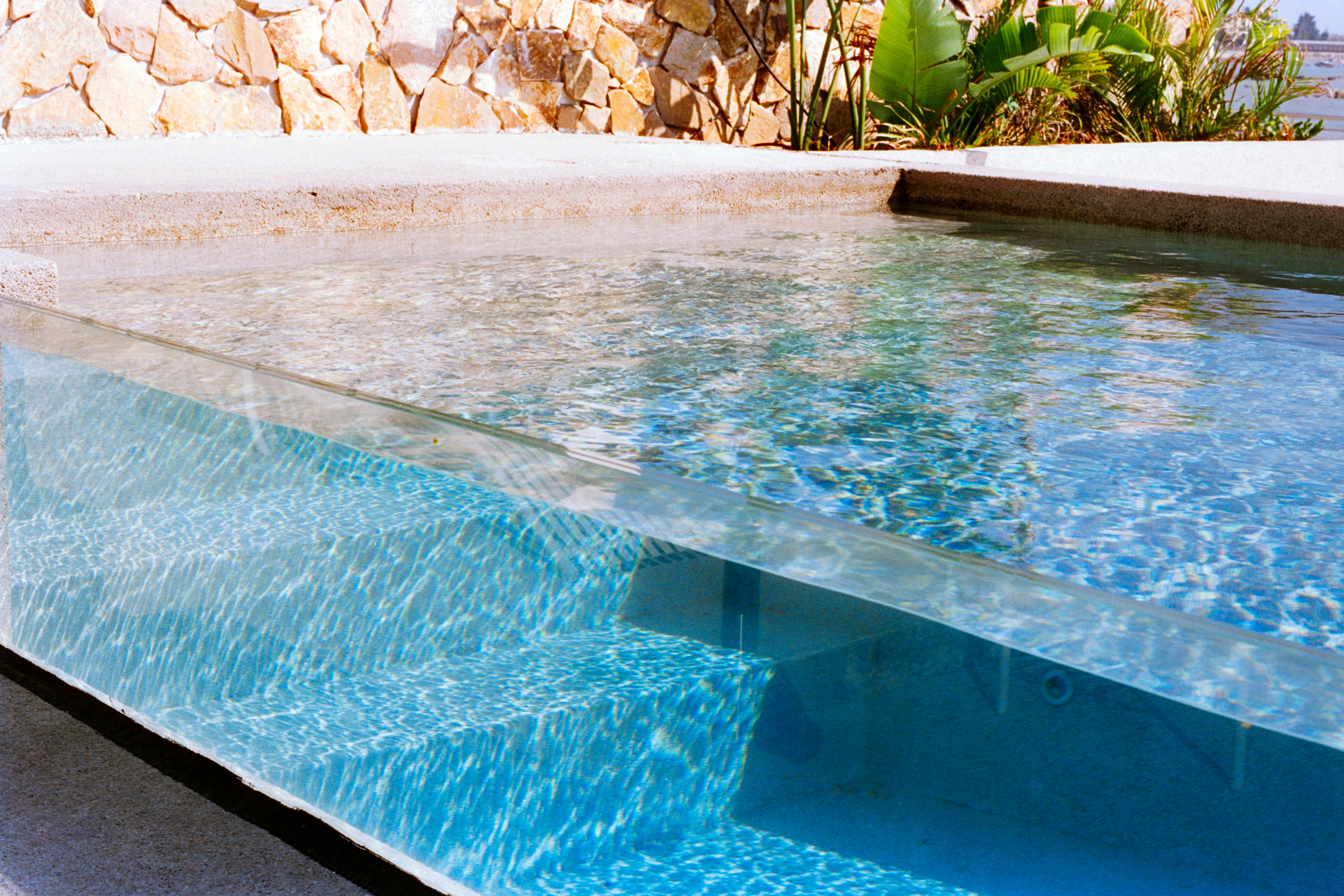 Clear blue water in a modern swimming pool.