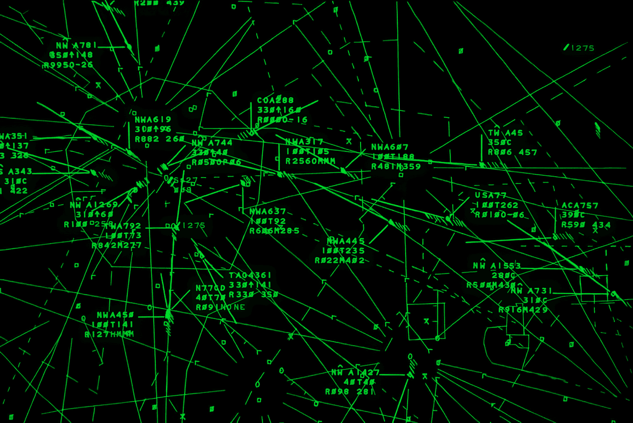 Green phosphor radar display showing intersecting flight paths and aircraft identifiers, representing autonomous systems operating within controlled airspace