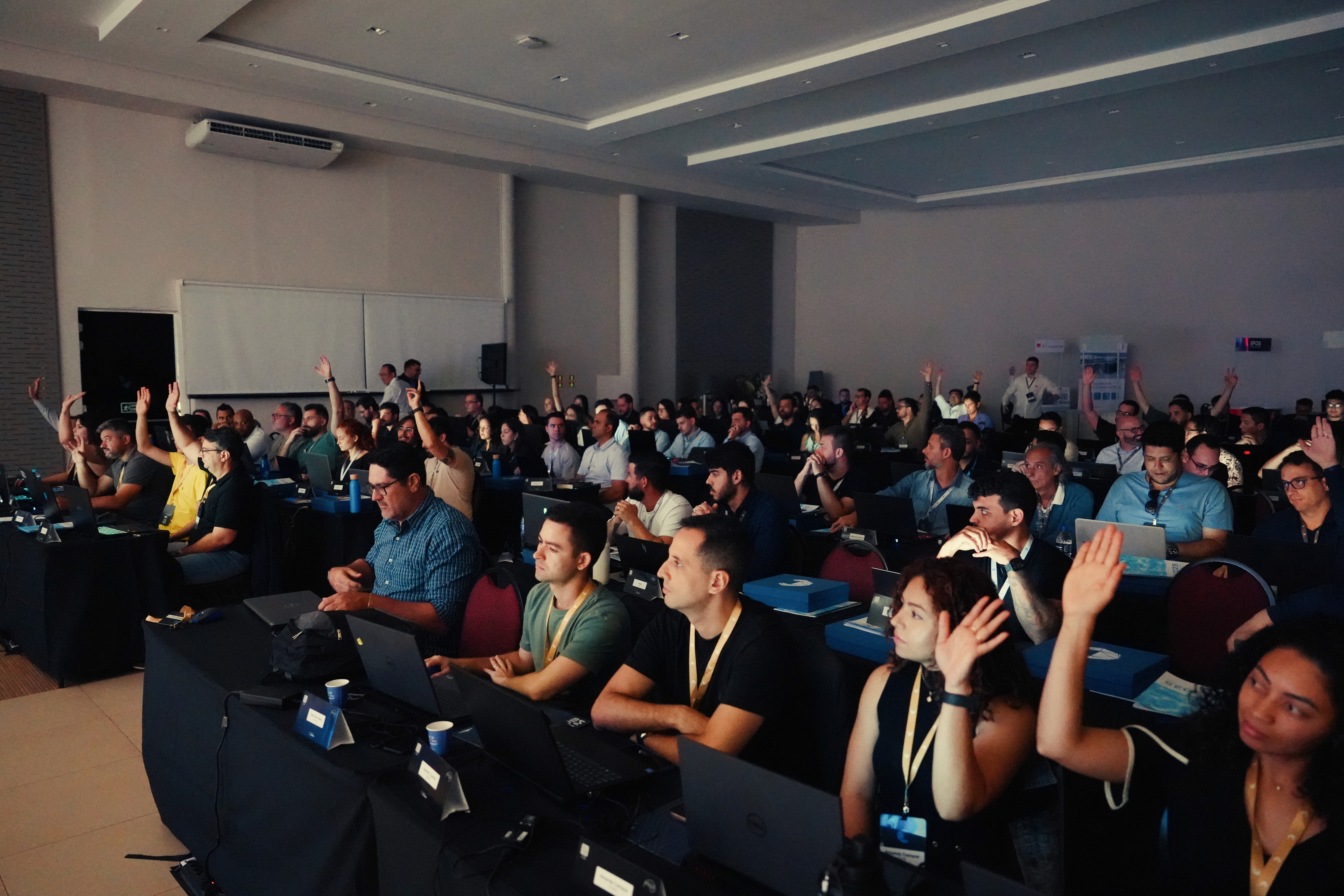 Imagem de pessoas sentadas no evento IPM