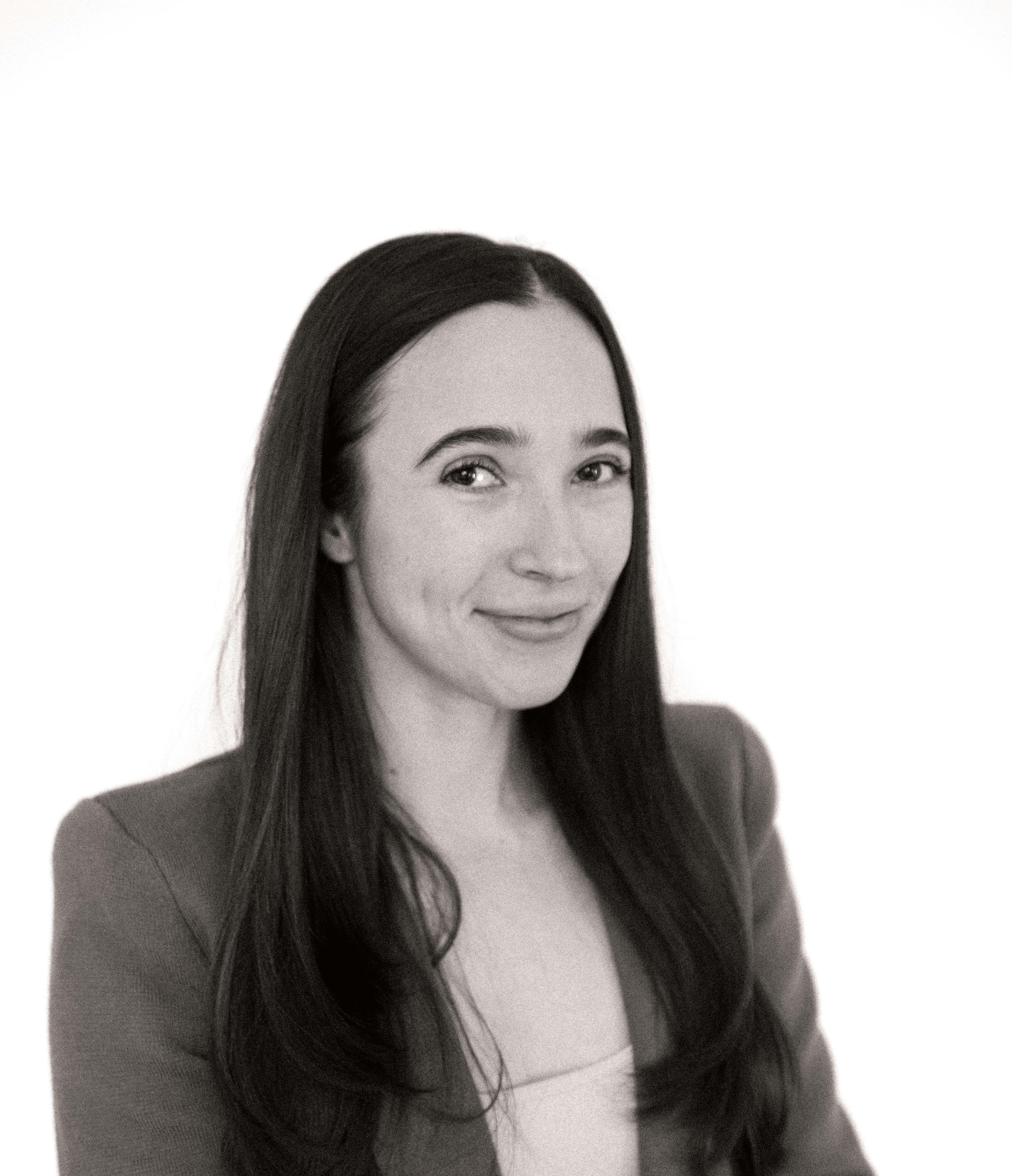 a blurry photo of a person standing in front of a wall