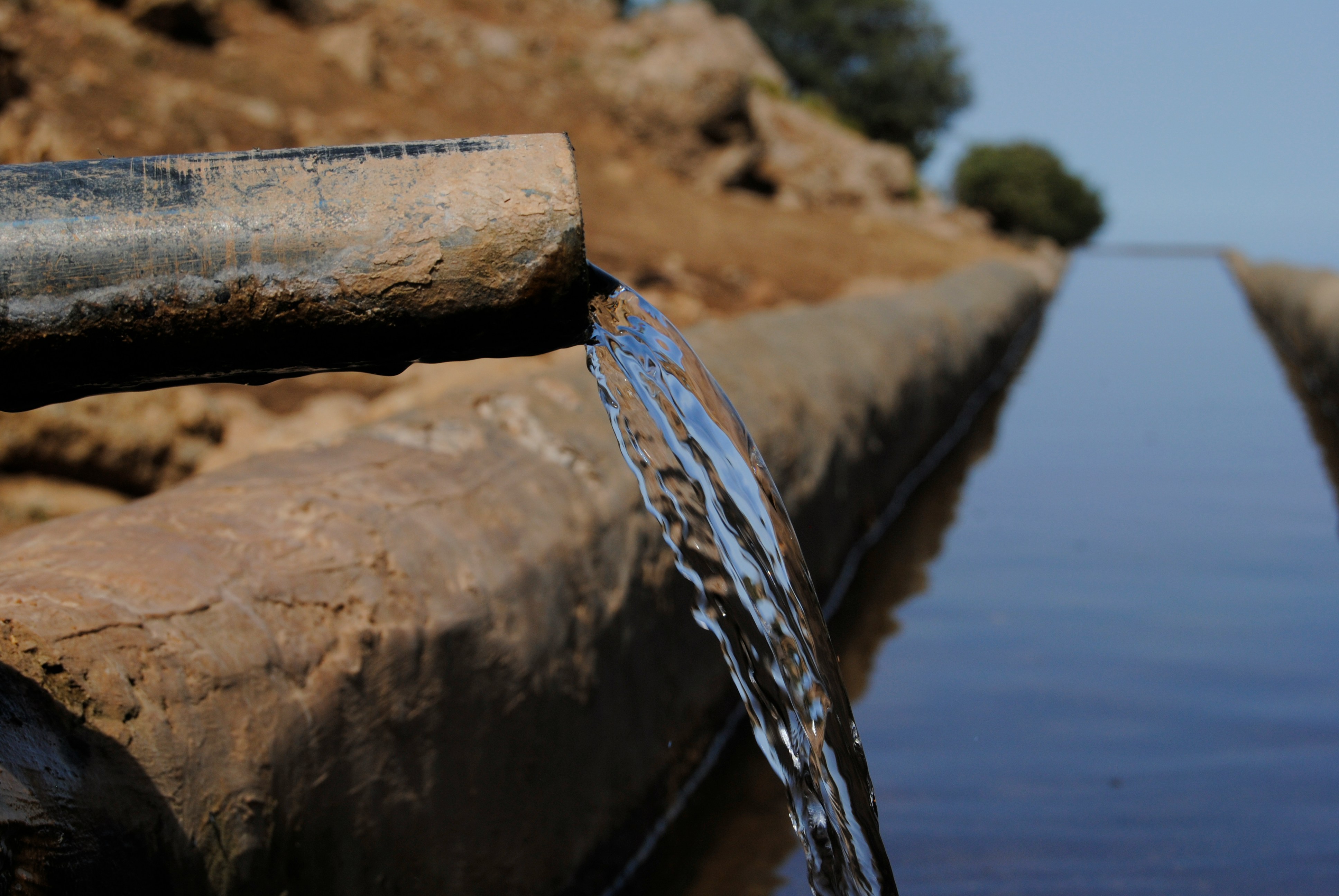 Water flowing out of a pipe