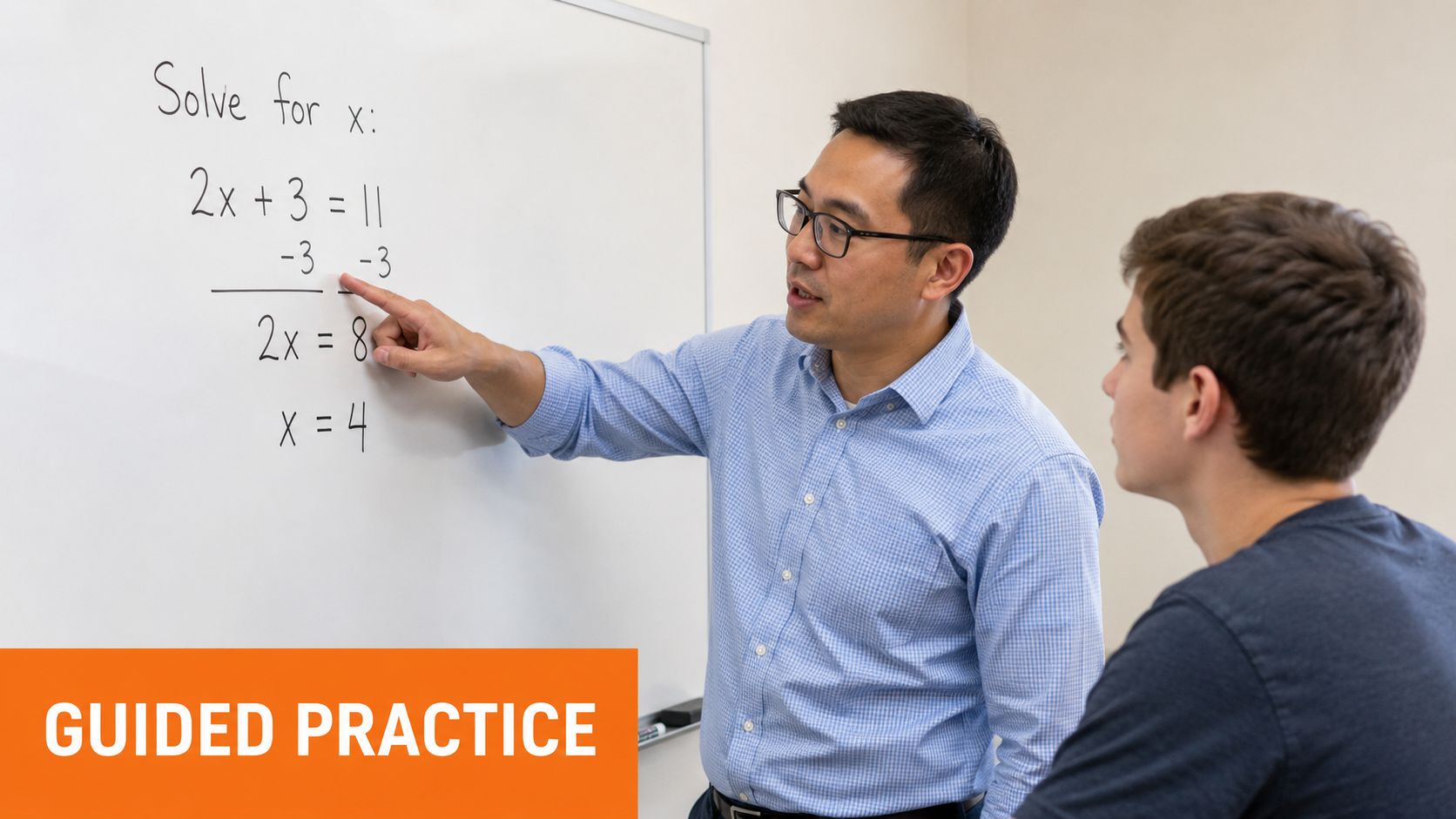 A male teacher wearing glasses explains an algebra equation to a student while pointing at a whiteboard.