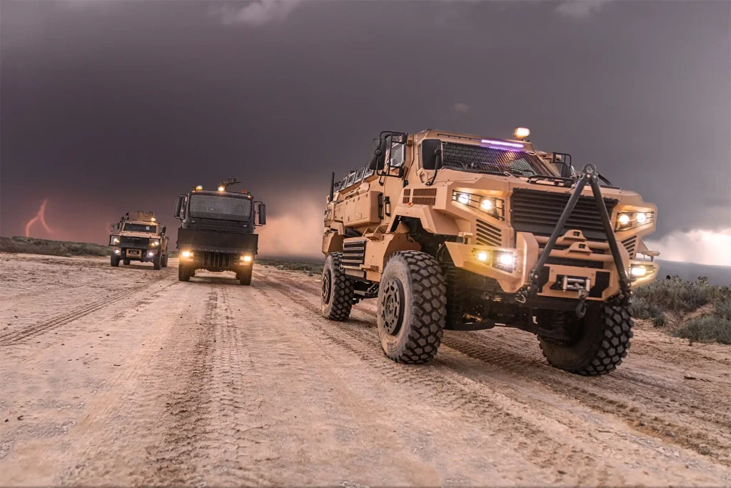 Greyrock's Armored vehicles driving on a dirt road