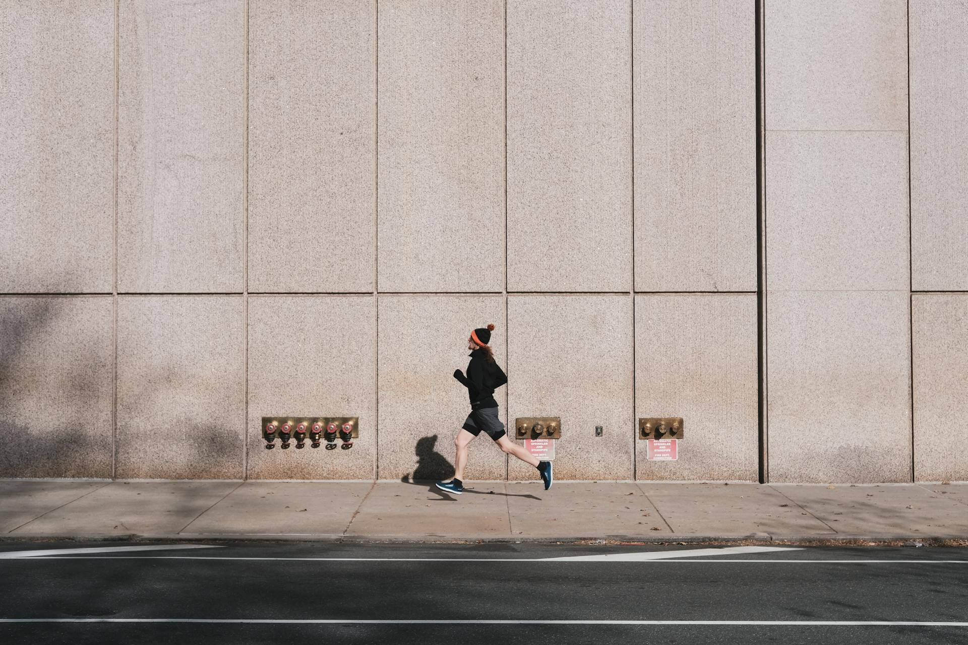 a women running down the road