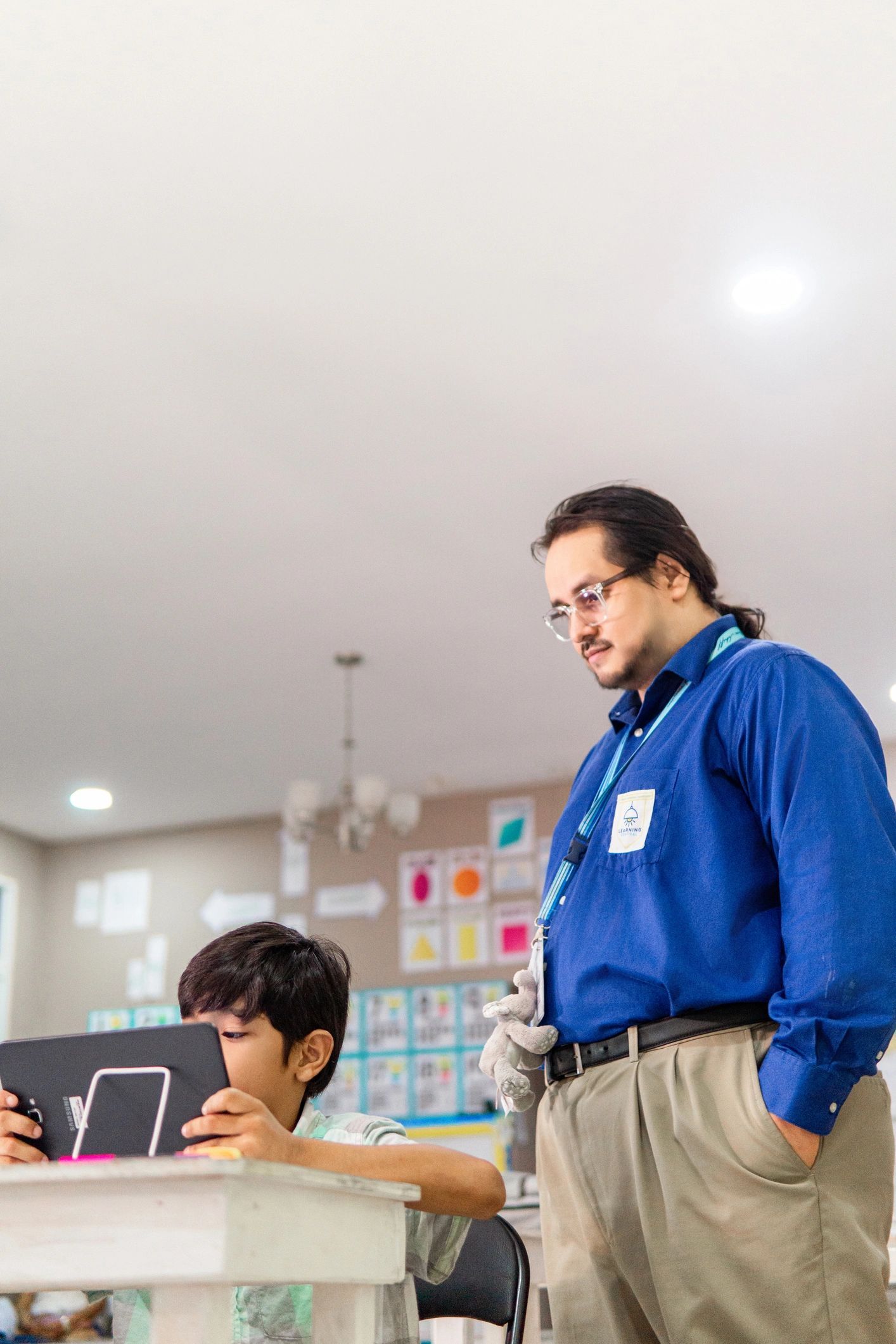 a black and white living room with a large tv