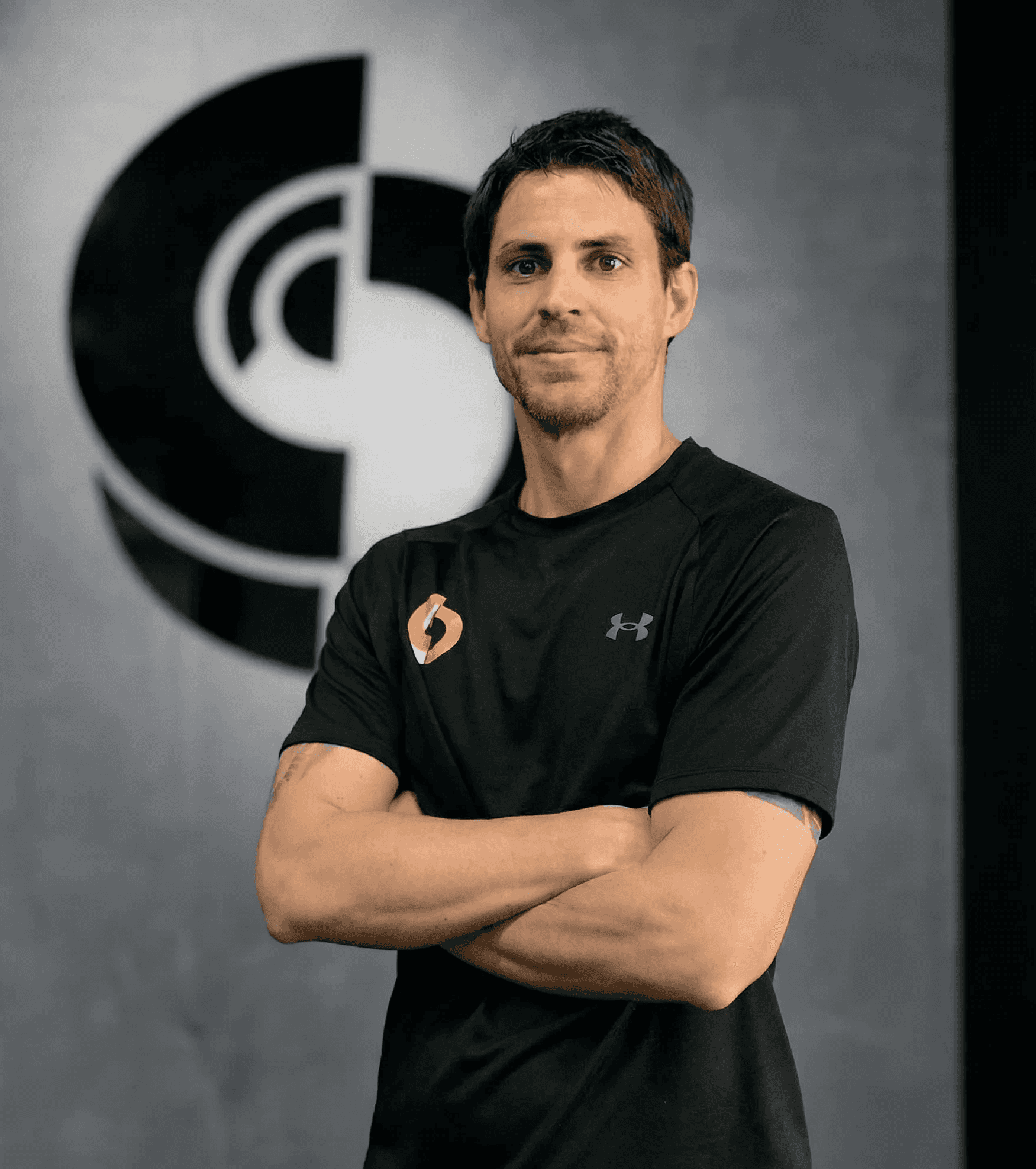 Rachel Stone, personal trainer working out sweaty with a barbell