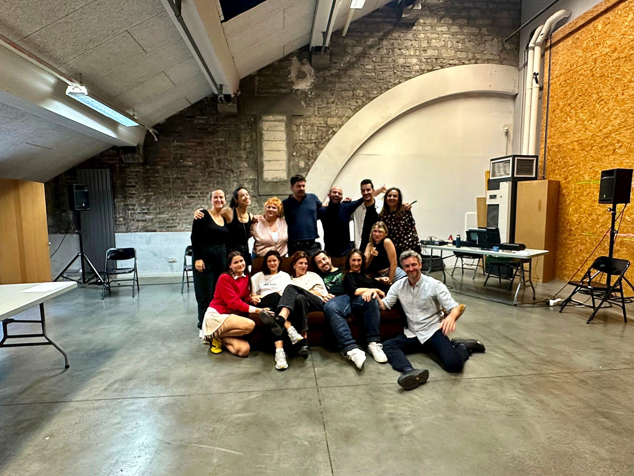 Athletes resting on a track after training.