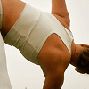 Woman strength training to preserve muscle mass, support bone density, and maintain physical independence with age.