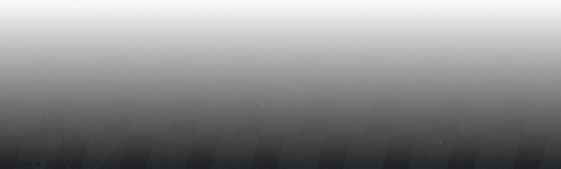 Drone shot of a running track at night