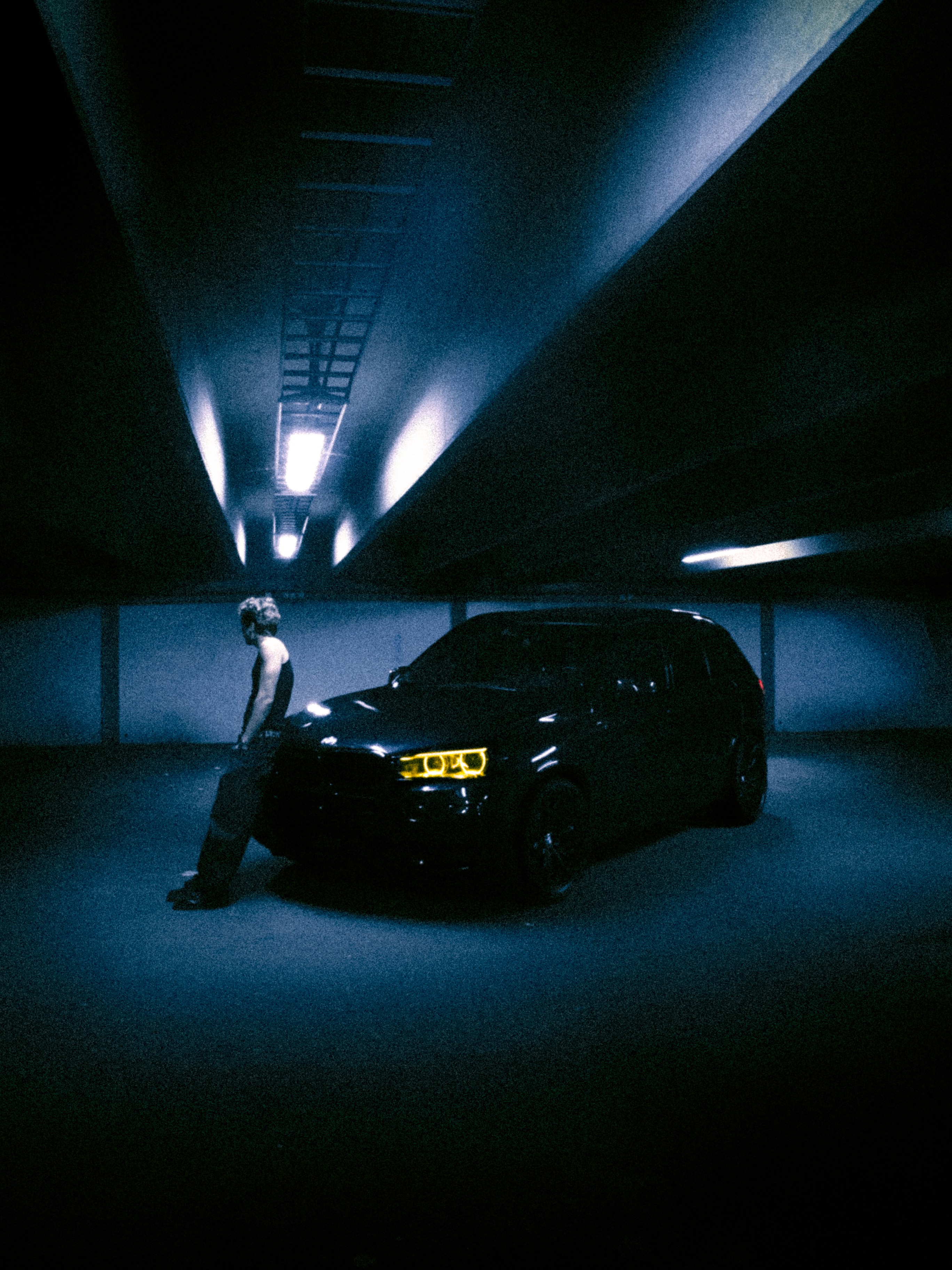 a woman holding a red flower