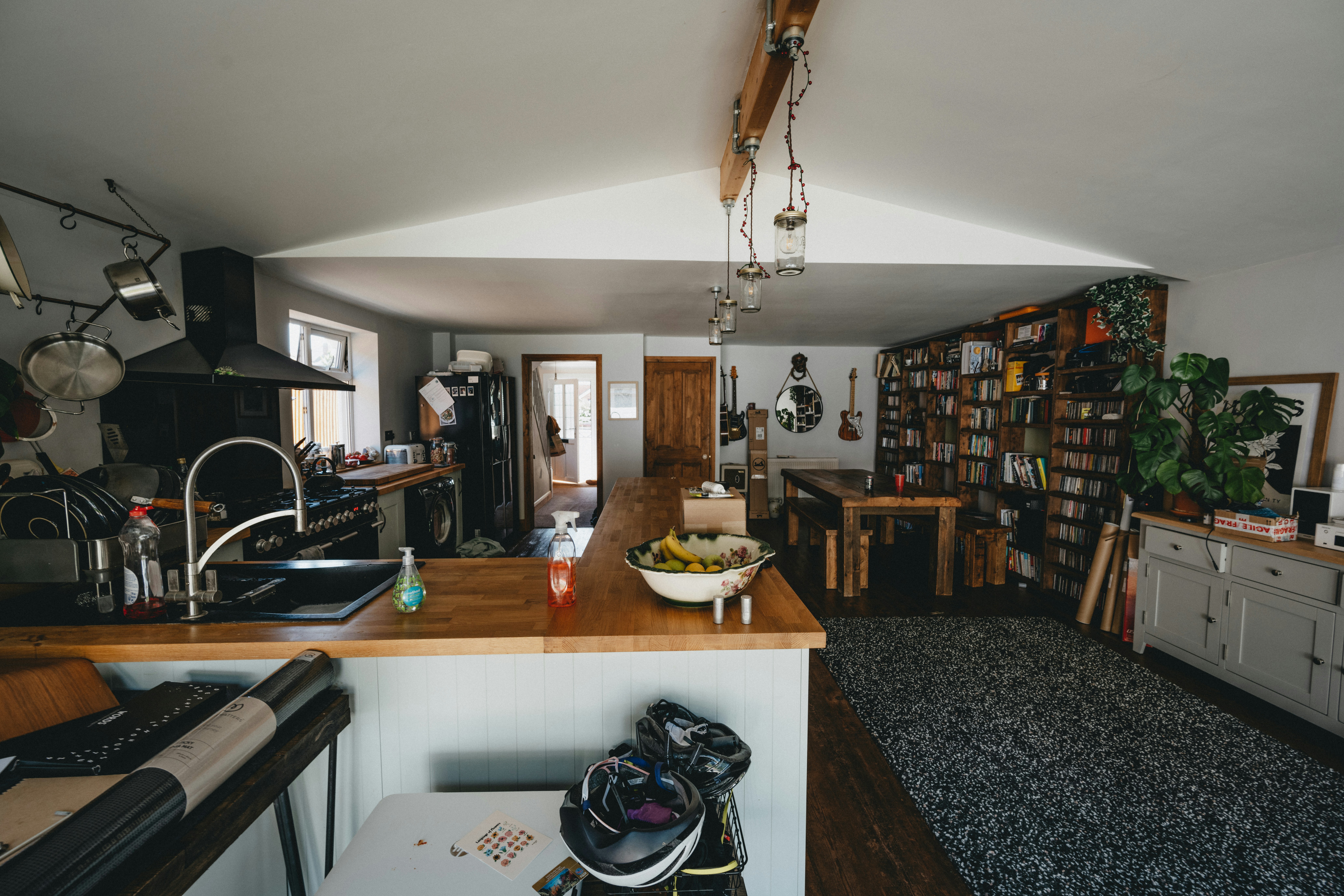 black and gray backpack on white table