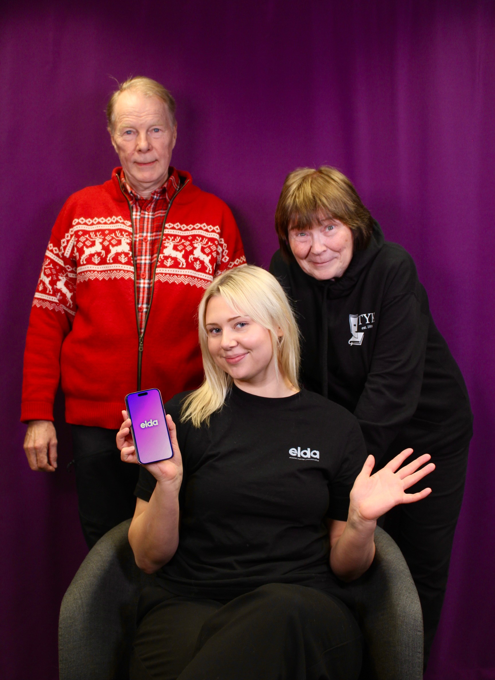 two people in a workspace working on their laptops 