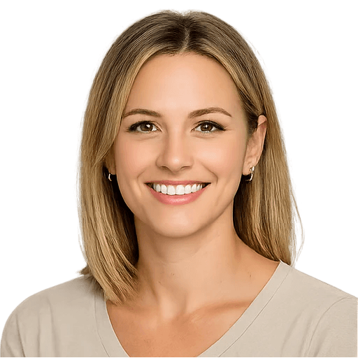 Portrait of a smiling woman with shoulder-length blonde hair against a light background.
