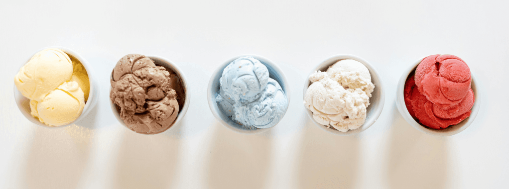 Five scoops of different ice cream flavours
