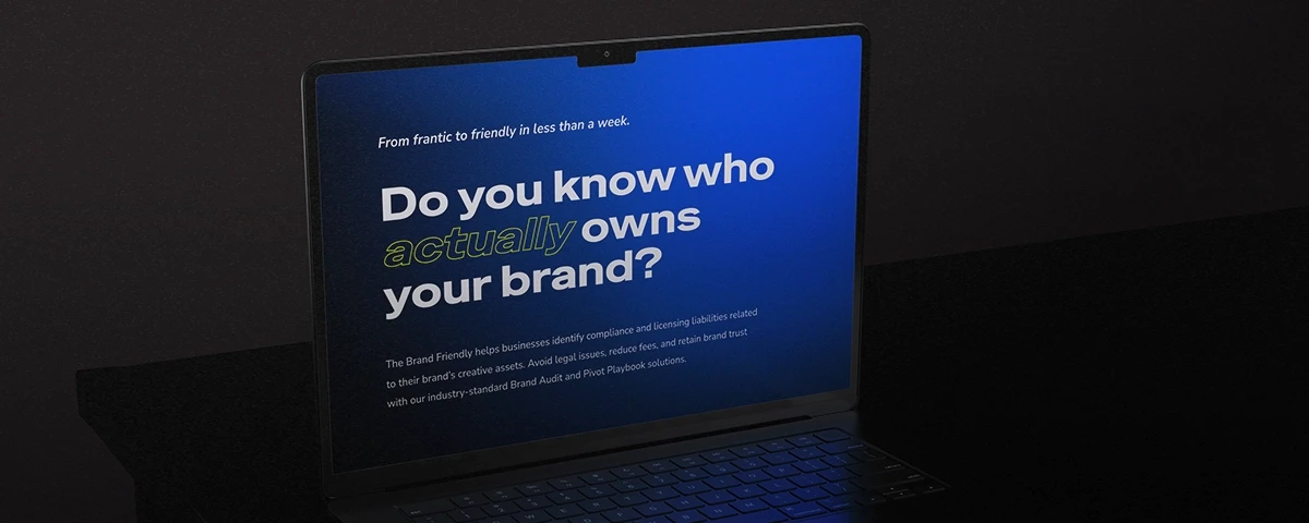 A mockup of an open laptop showing a branded graphic that asks, "Do you know who actually owns your brand?"