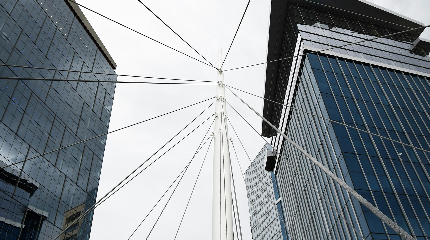 person writing on printing paper