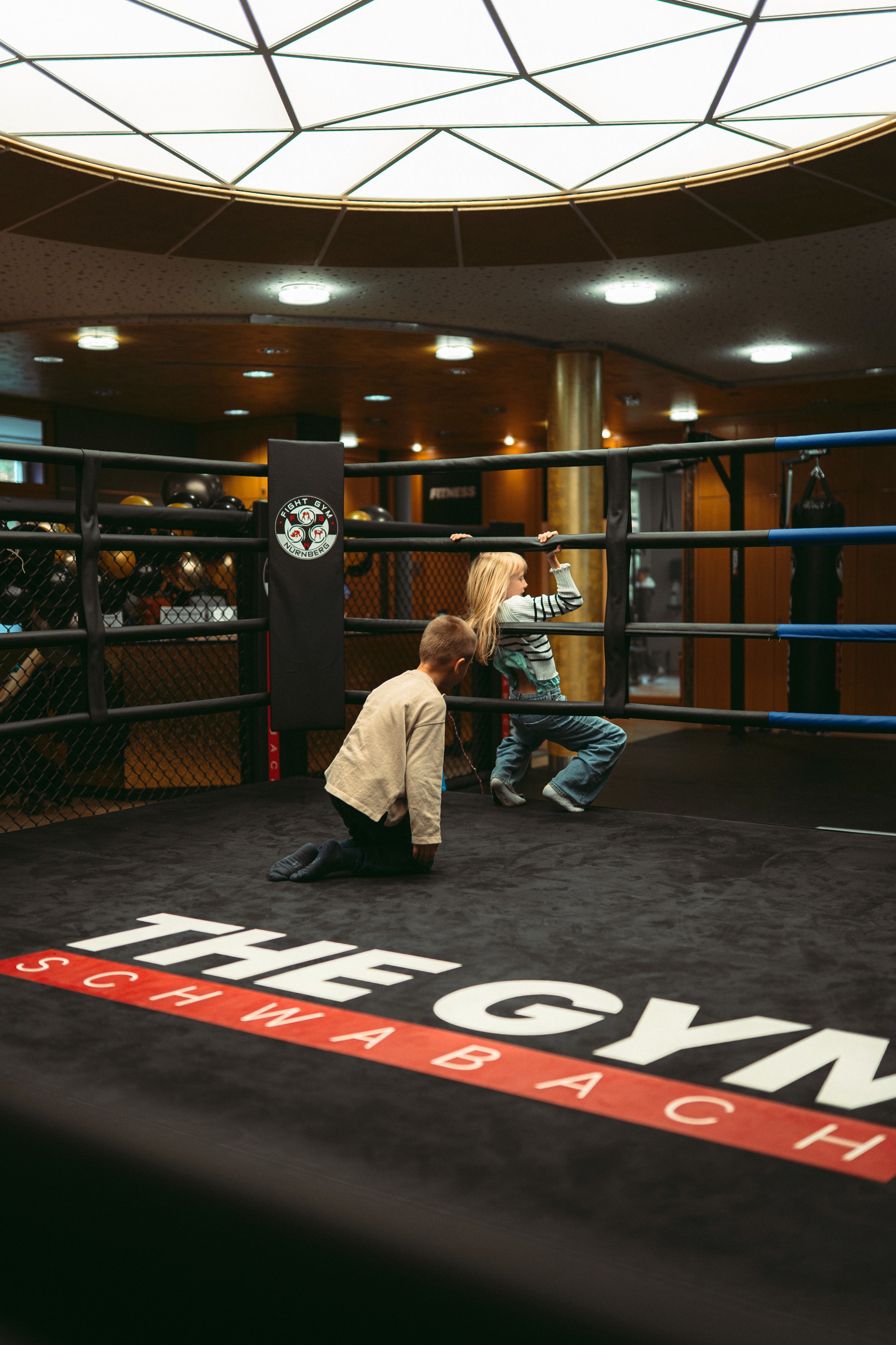 Rachel Stone standing with ABS and hands in her pockets