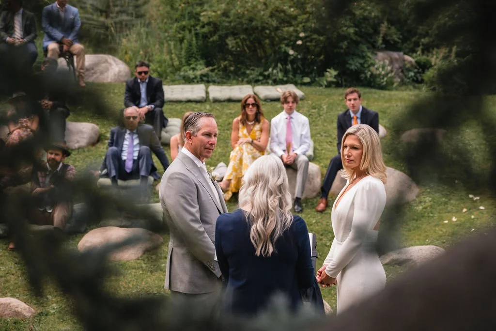Newlyweds celebrating down the aisle after Aspen wedding