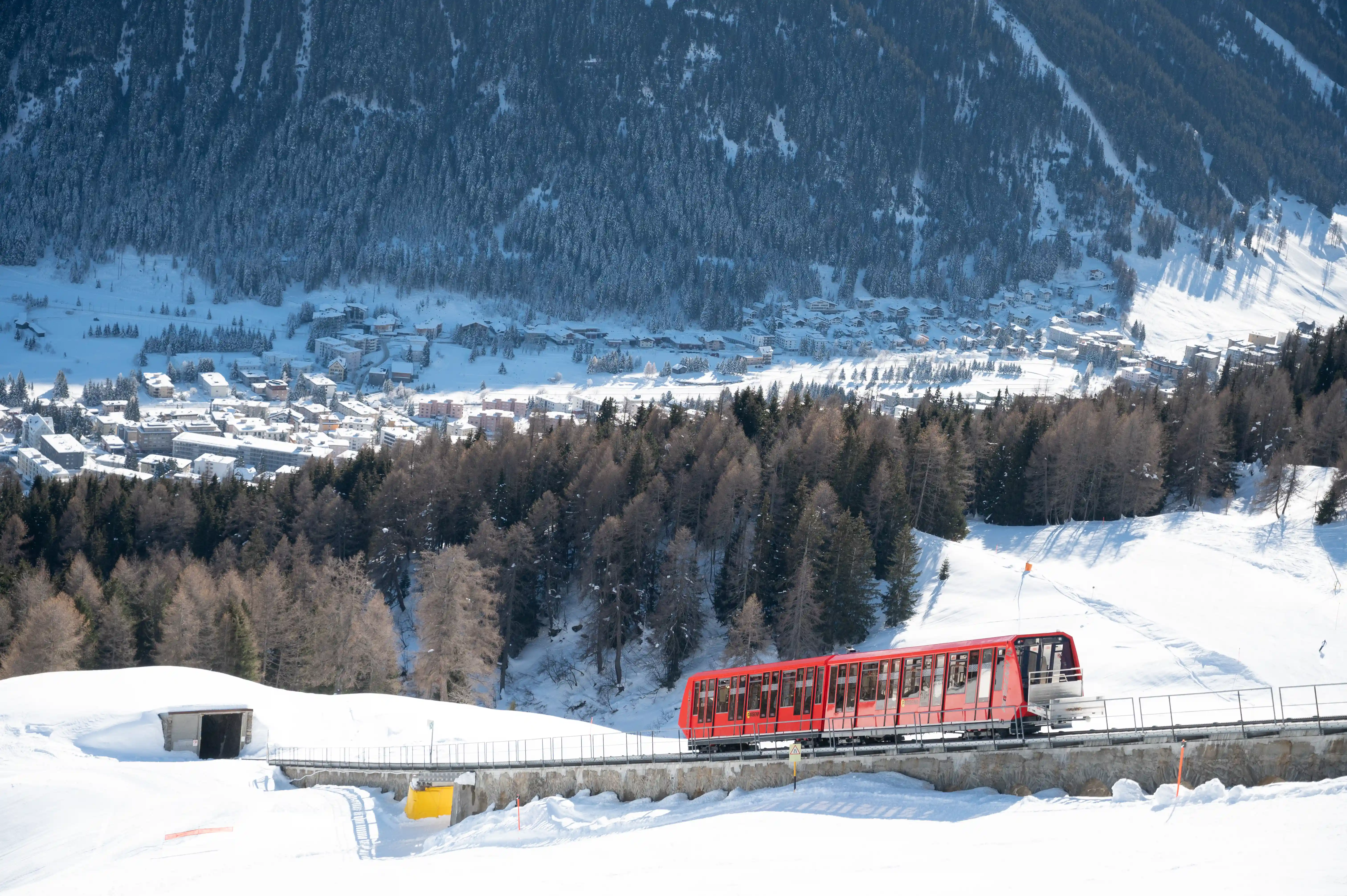 A train on Parsenn that takes you up the mountain.