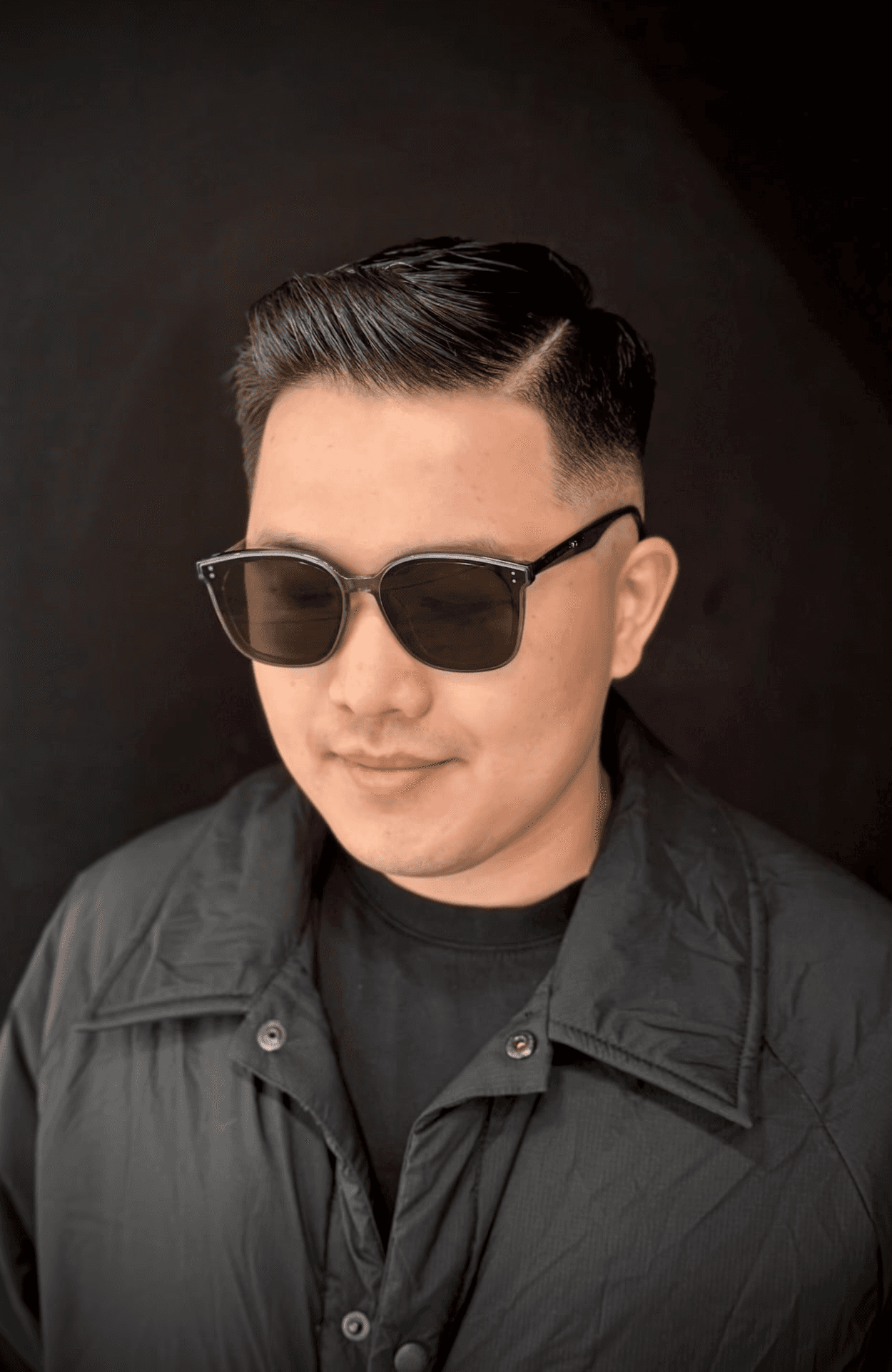 Asian male. Combover mid fade with part design. Sunglasses. West Hollywood luxury barber Courtney Palmore. The Rich Barber Hair Studio
