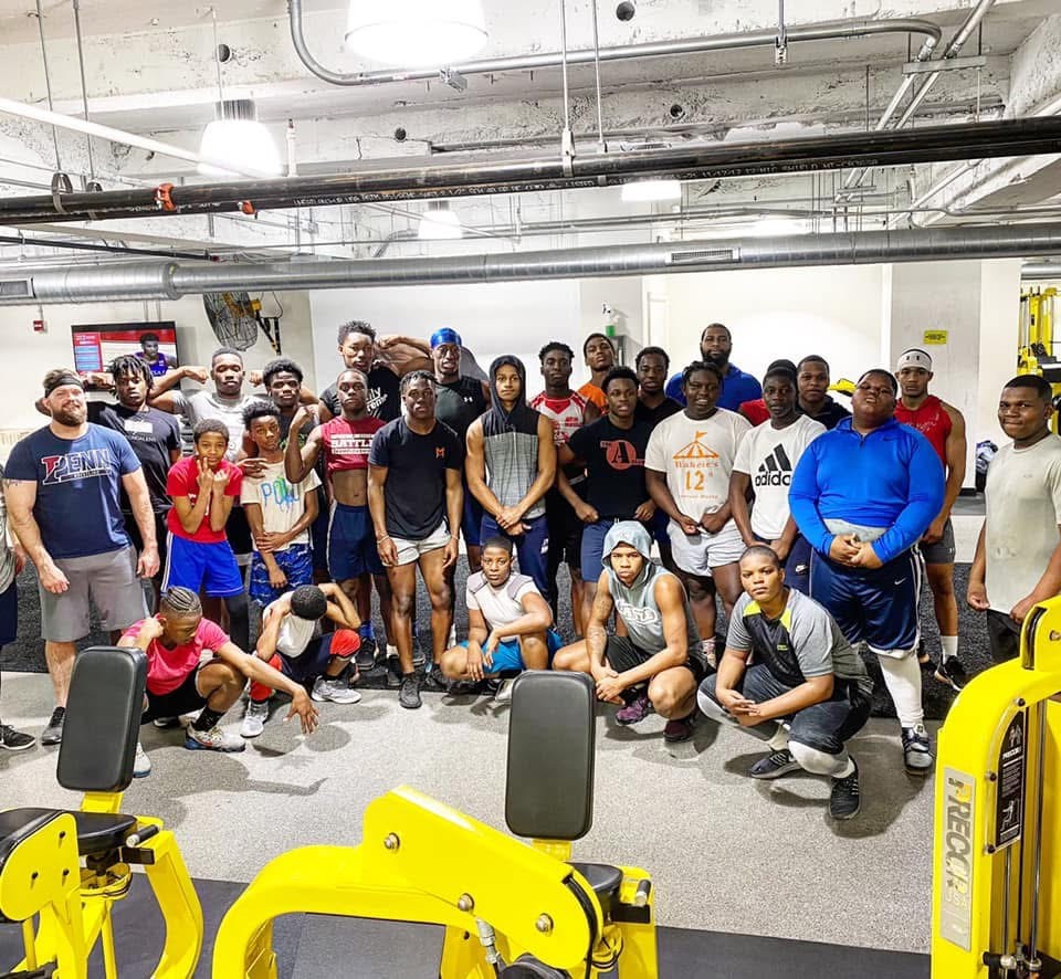 Youth athletes pose for a group photo