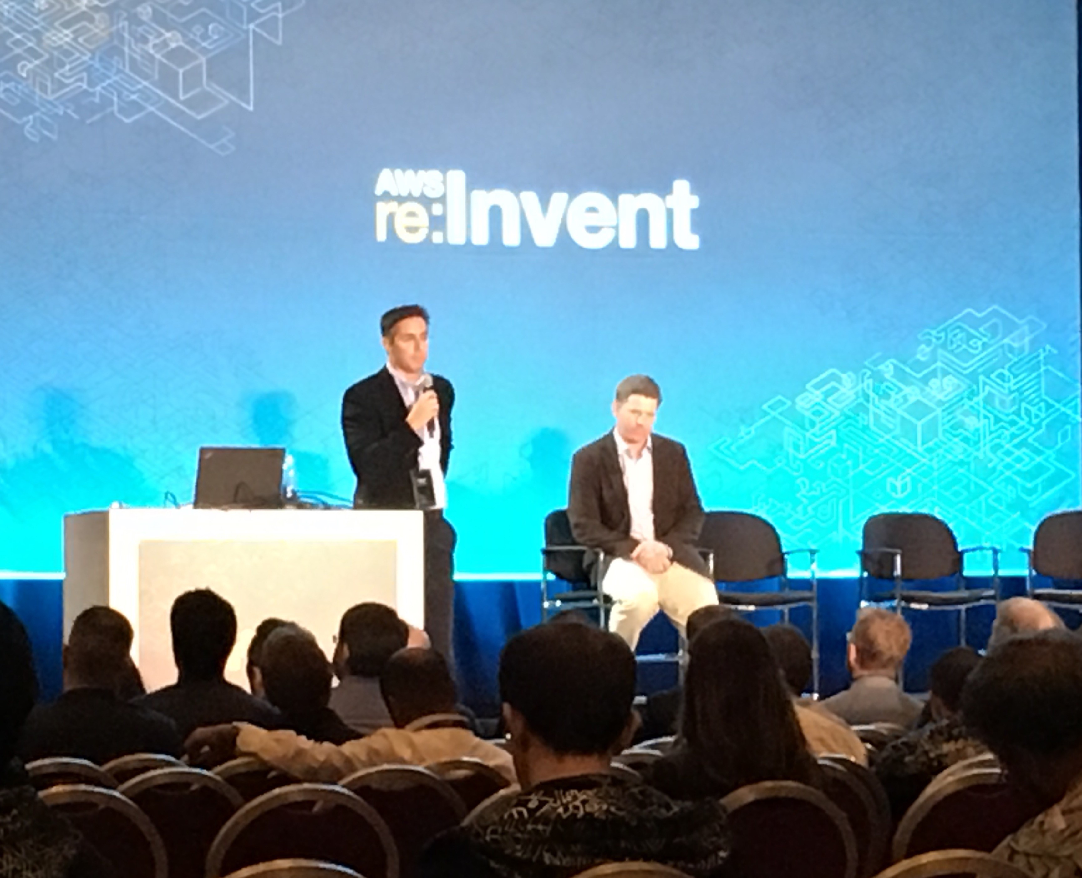 On stage at AWS re:Invent, Las Vegas — with Chris Smith, Manager of Infrastructure Engineering at TaylorMade Golf.