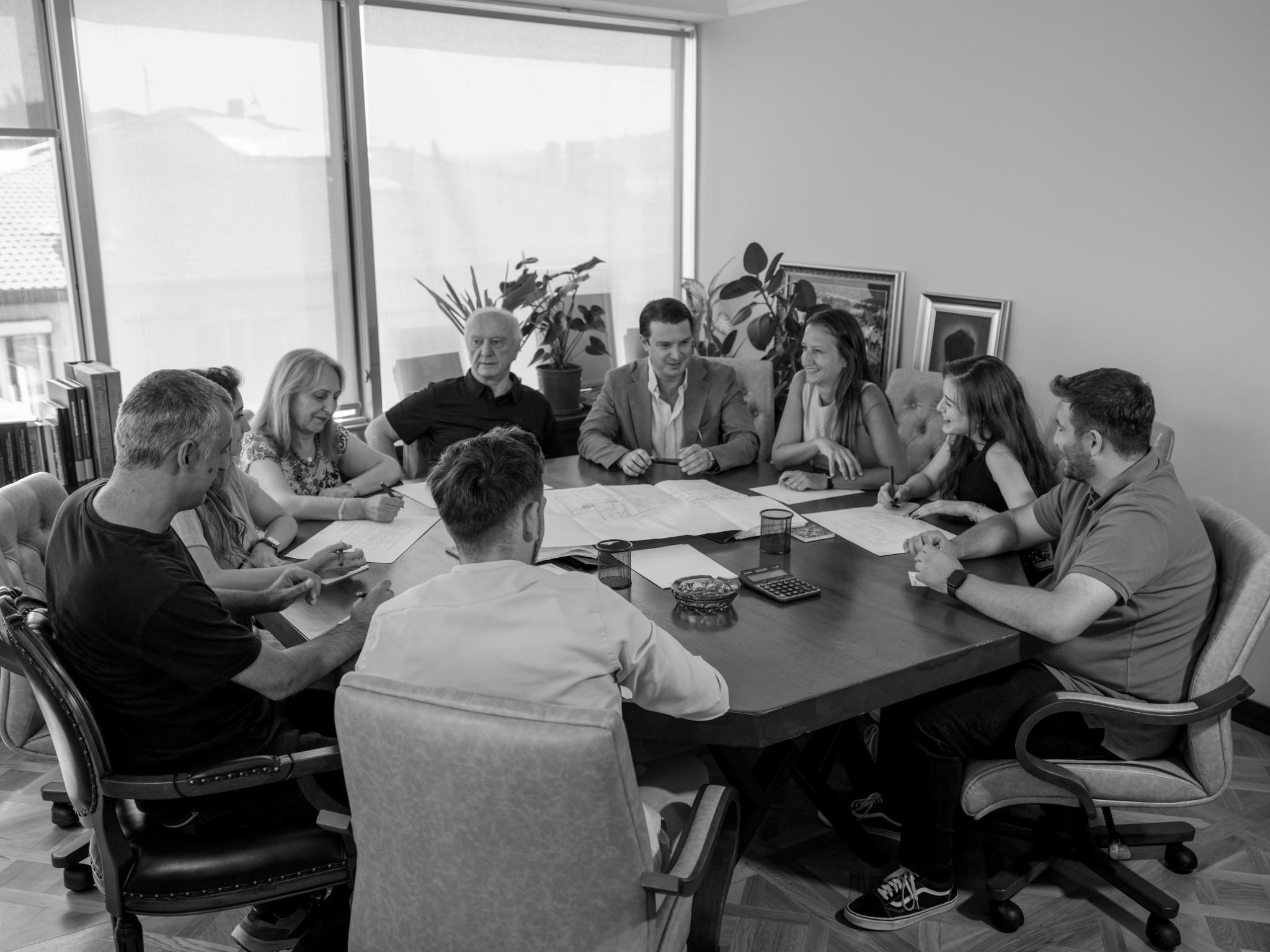 Team working in an office watching at a presentation