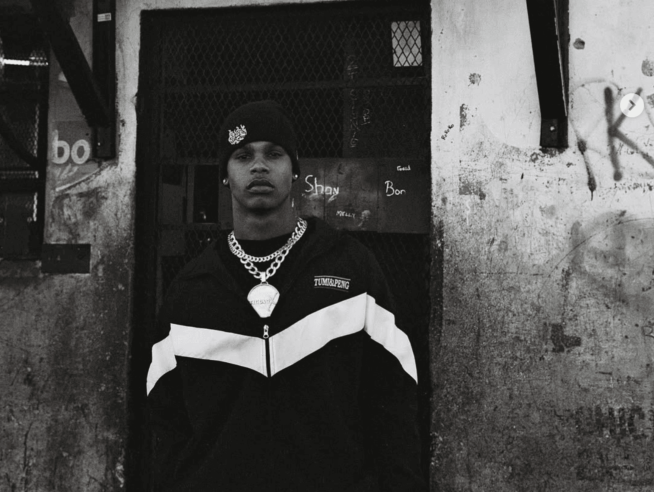 Lush green conical mountains under a hazy sky