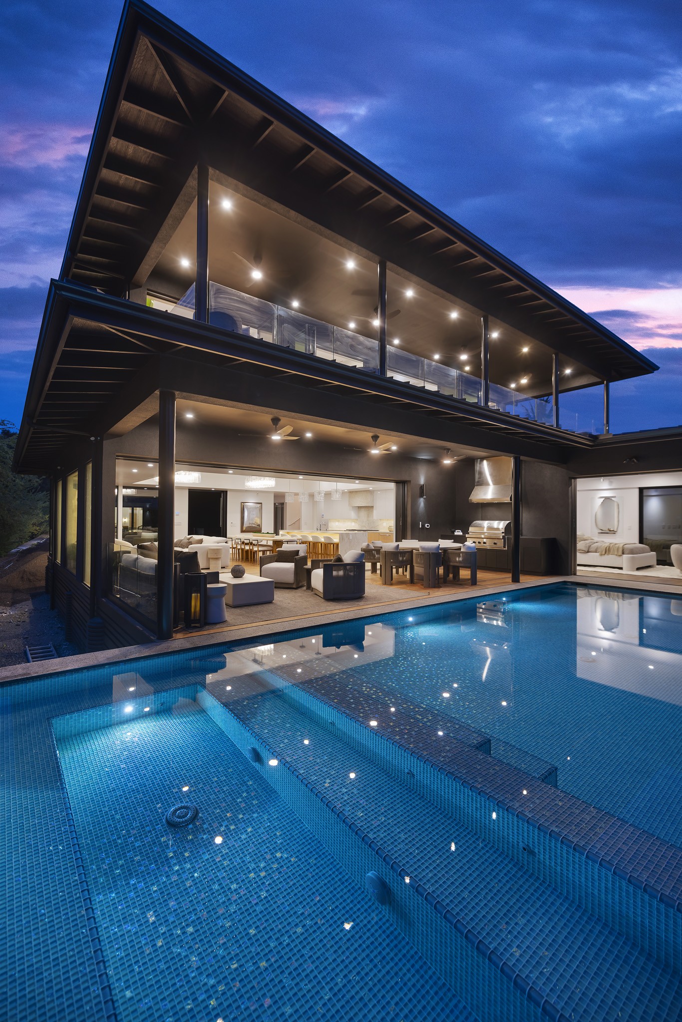 Entry court and water feature of a custom home in Kailua-Kona