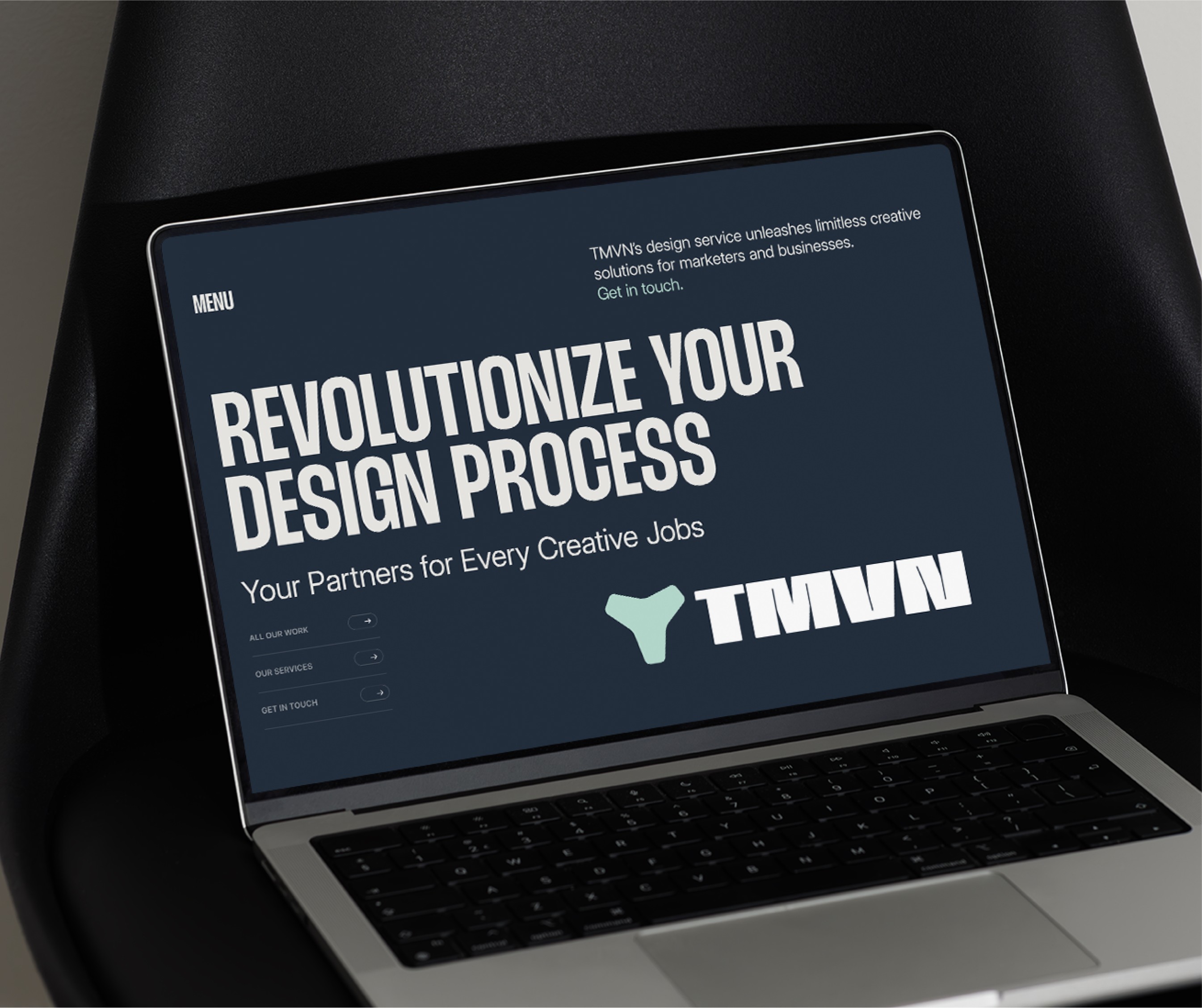 Website displayed on a laptop