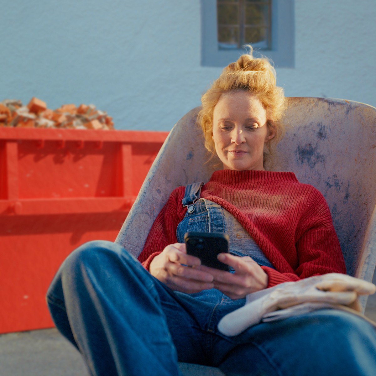 Frau in Schubkarre Sujet