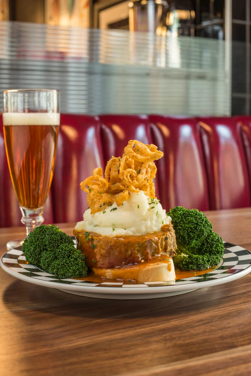 Diner meatloaf with mashed potatoes and onion rings