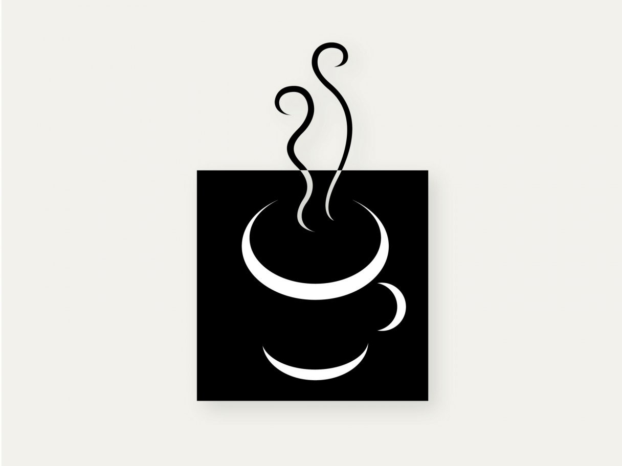 Rustic cabin in a golden field at sunset