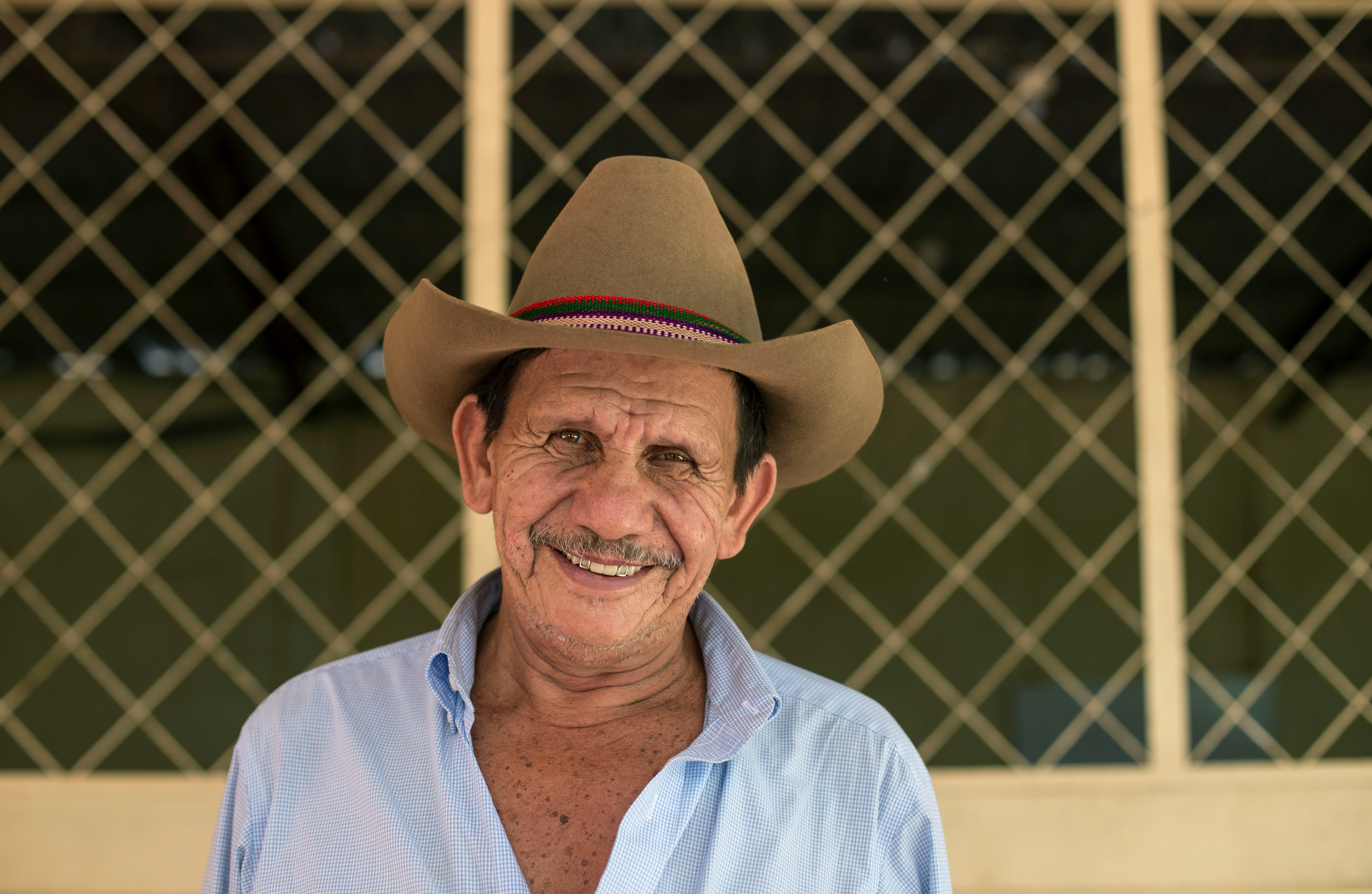 man wearing brown cowboy hat