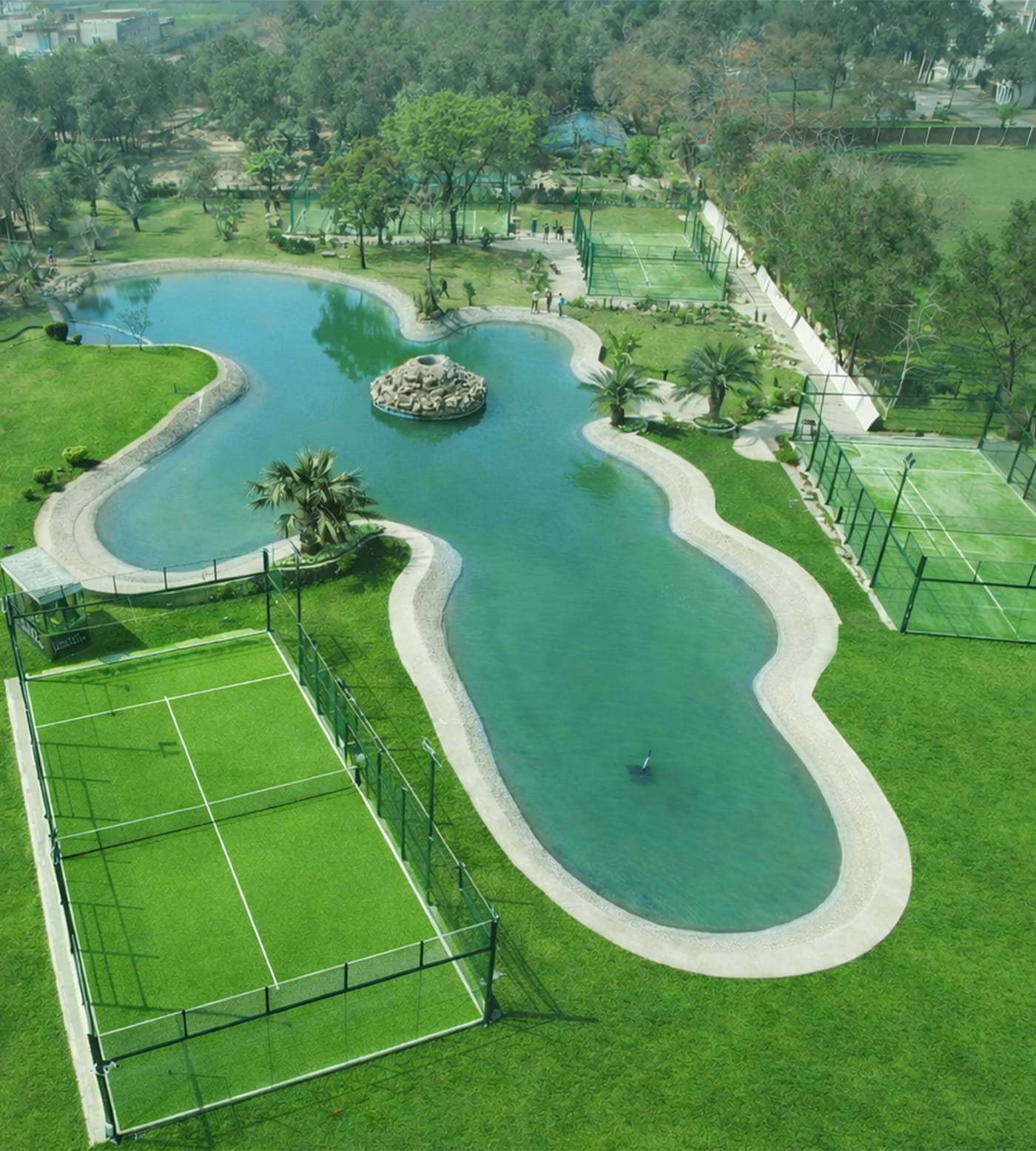 A close-up shot of a handcrafted welcome cocktail served at a Mediterranean hotel patio