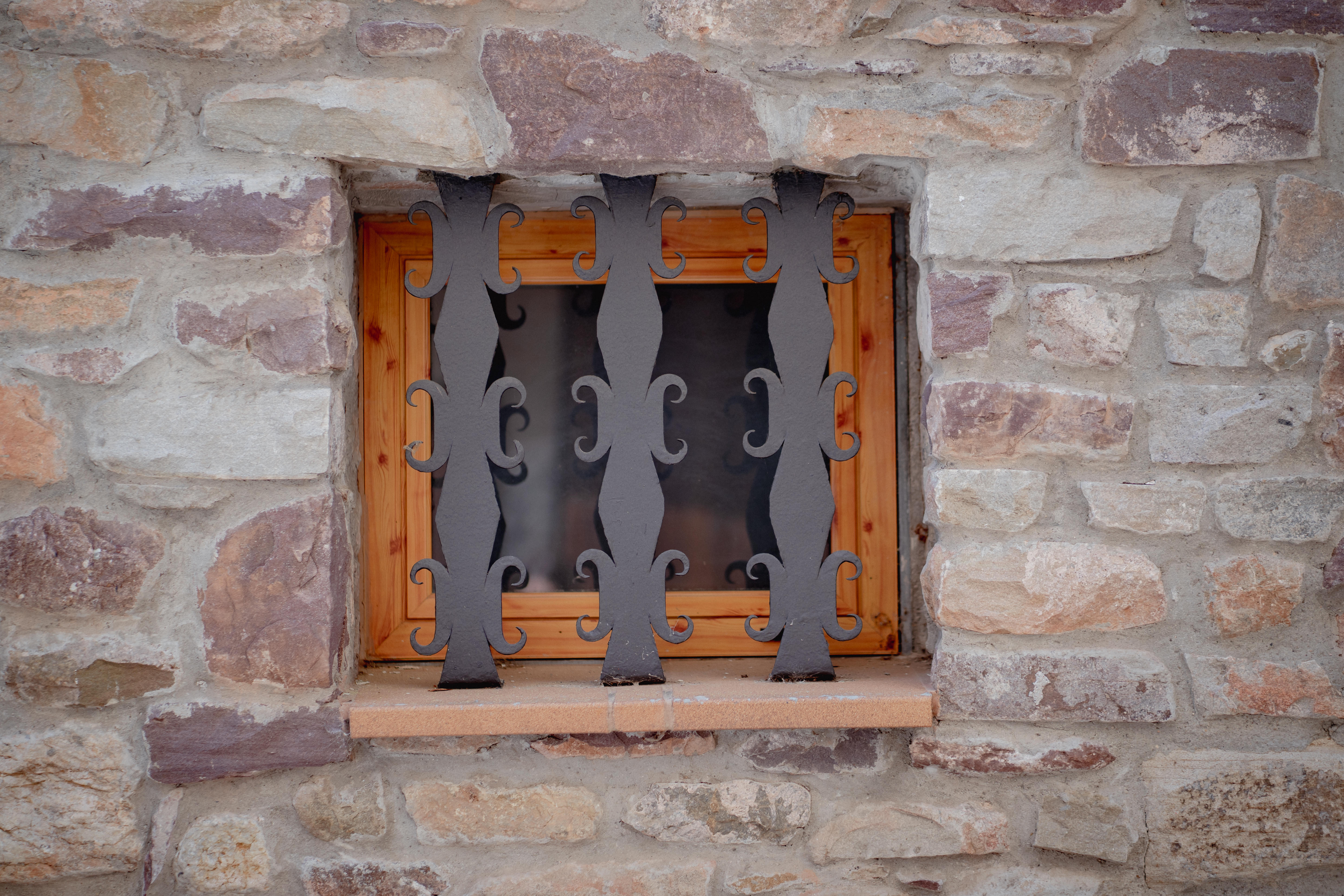 art deco styled bedroom with accsent mirror above the bed
