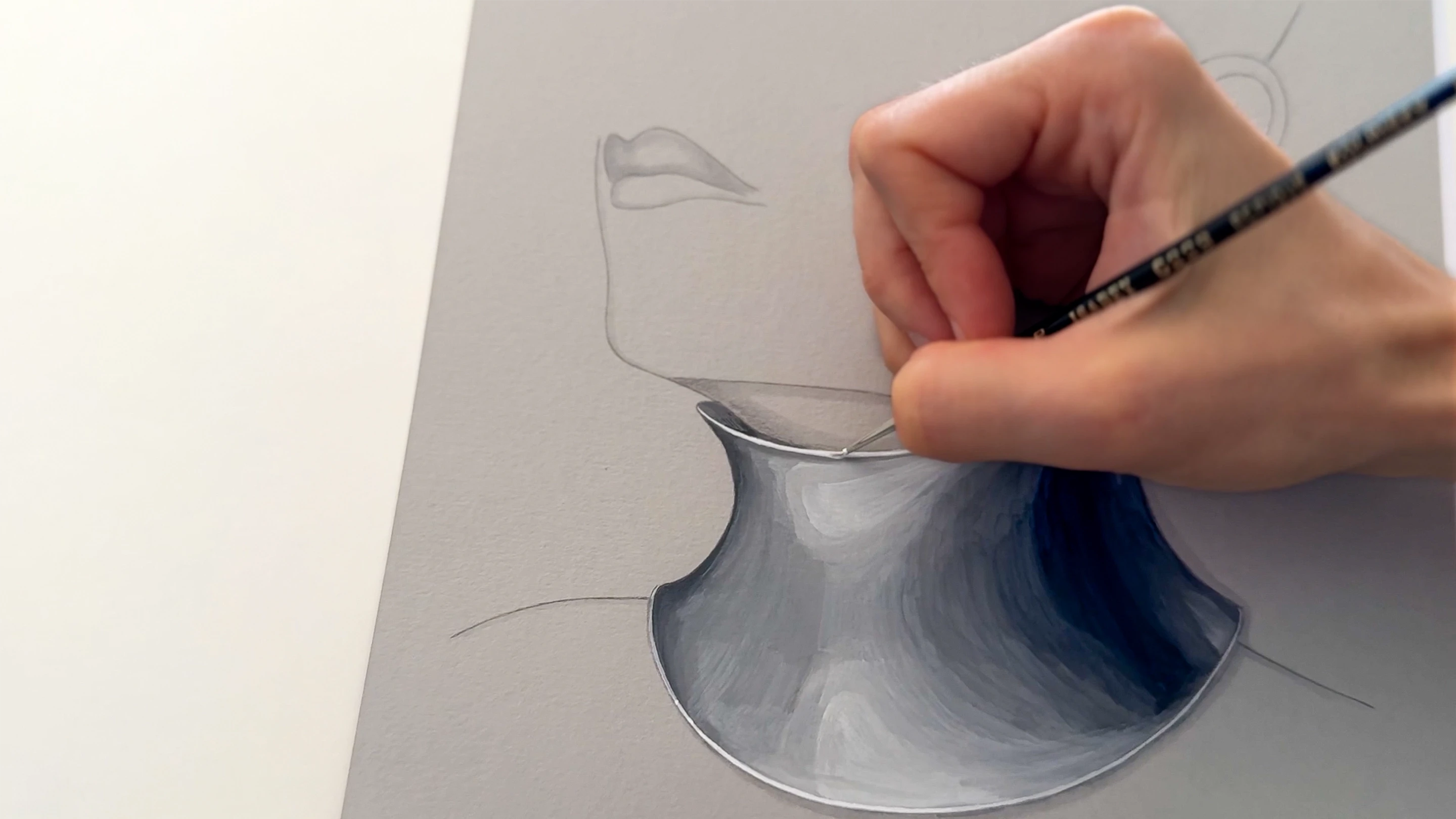 Designer sketching a sculptural 12 fine jewellery design by hand